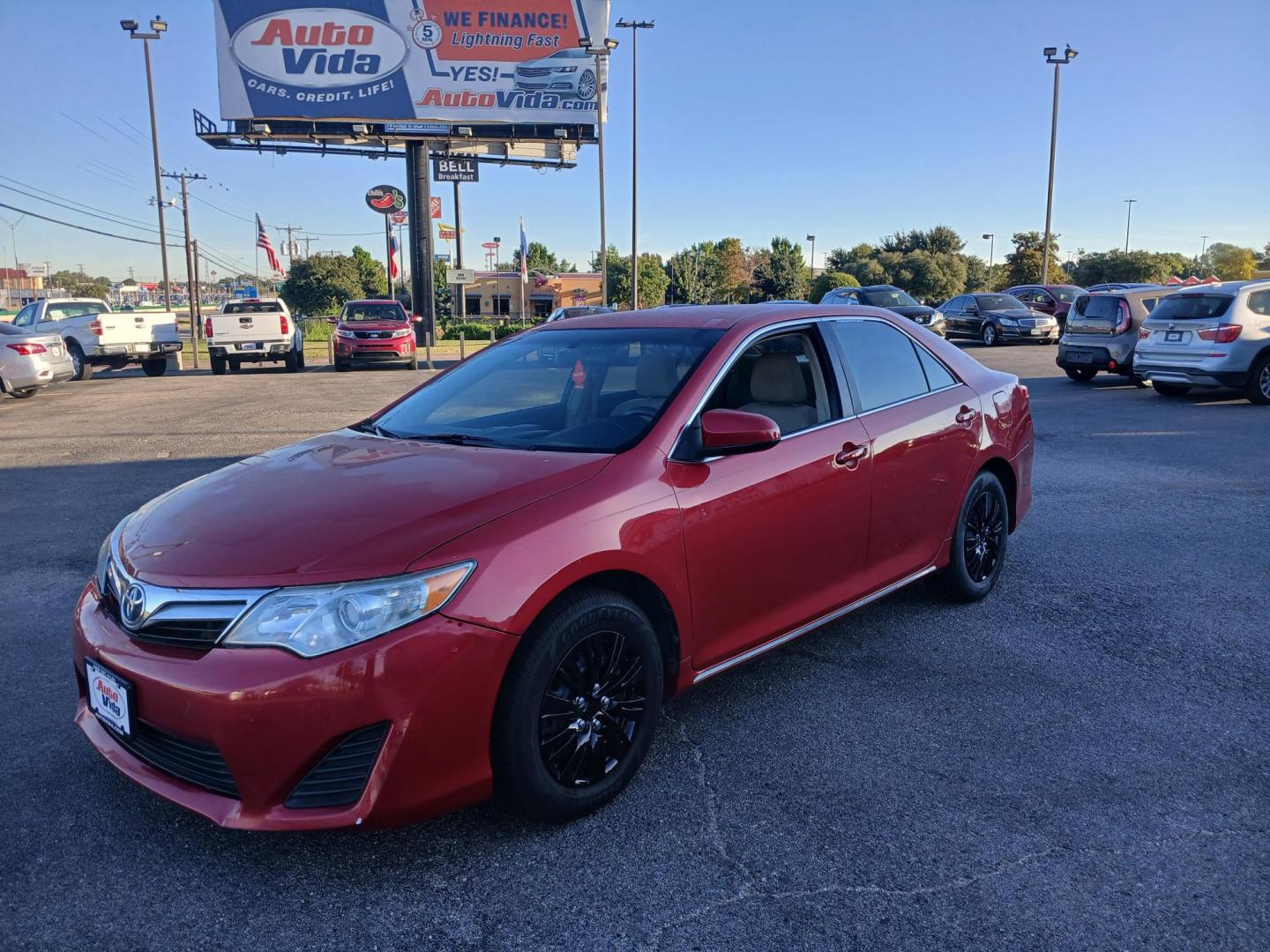 2014 RED Toyota Camry L (4T4BF1FK8ER) with an 2.5L L4 DOHC 16V engine, 6-Speed Automatic transmission, located at 420 I-35E, Lancaster, TX, 75146, (469) 297-4144, 32.593929, -96.823685 - Photo#0