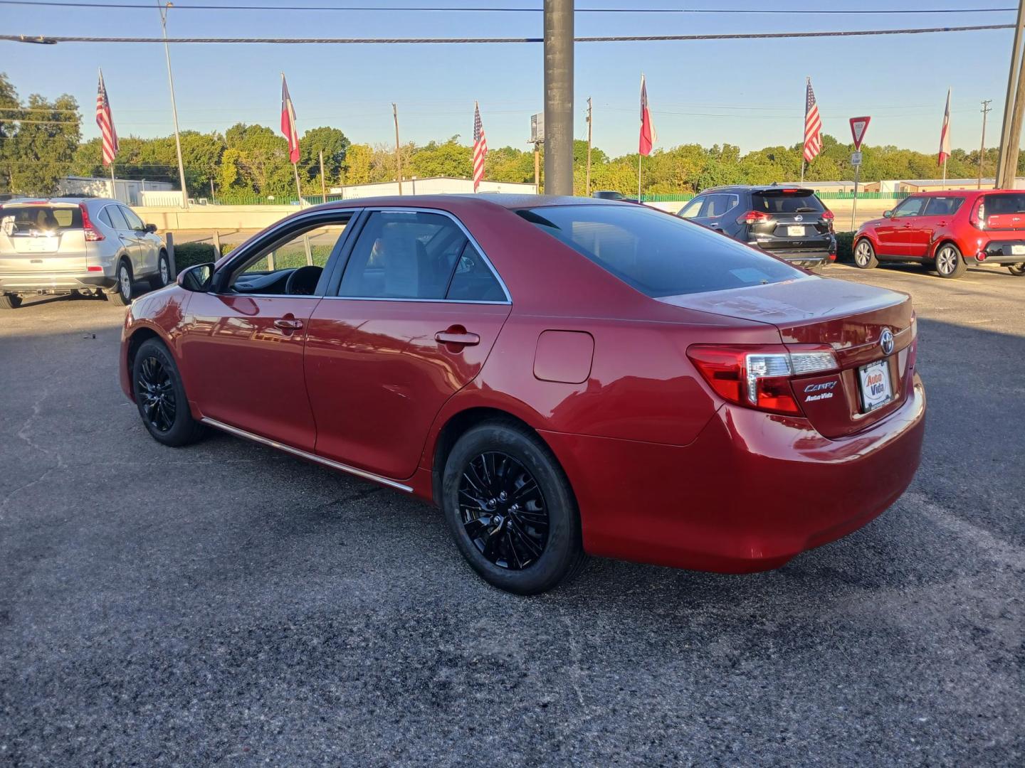 2014 RED Toyota Camry L (4T4BF1FK8ER) with an 2.5L L4 DOHC 16V engine, 6-Speed Automatic transmission, located at 420 I-35E, Lancaster, TX, 75146, (469) 297-4144, 32.593929, -96.823685 - Photo#1