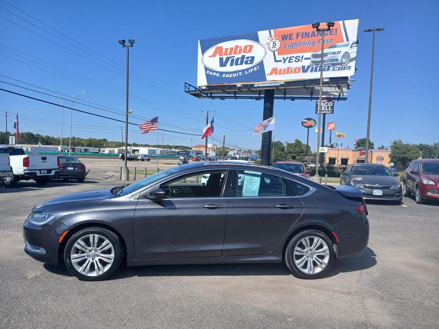 2015 GRAY Chrysler 200 Limited (1C3CCCAB0FN) with an 2.4L L4 DOHC 16V engine, 9-Speed Automatic transmission, located at 420 I-35E, Lancaster, TX, 75146, (469) 297-4144, 32.593929, -96.823685 - Photo#1