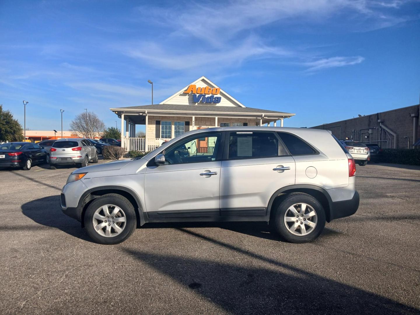 2013 SILVER Kia Sorento LX 2WD (5XYKT3A1XDG) with an 2.4L L4 DOHC 16V engine, 6-Speed Automatic transmission, located at 420 I-35E, Lancaster, TX, 75146, (469) 297-4144, 32.593929, -96.823685 - Photo#1