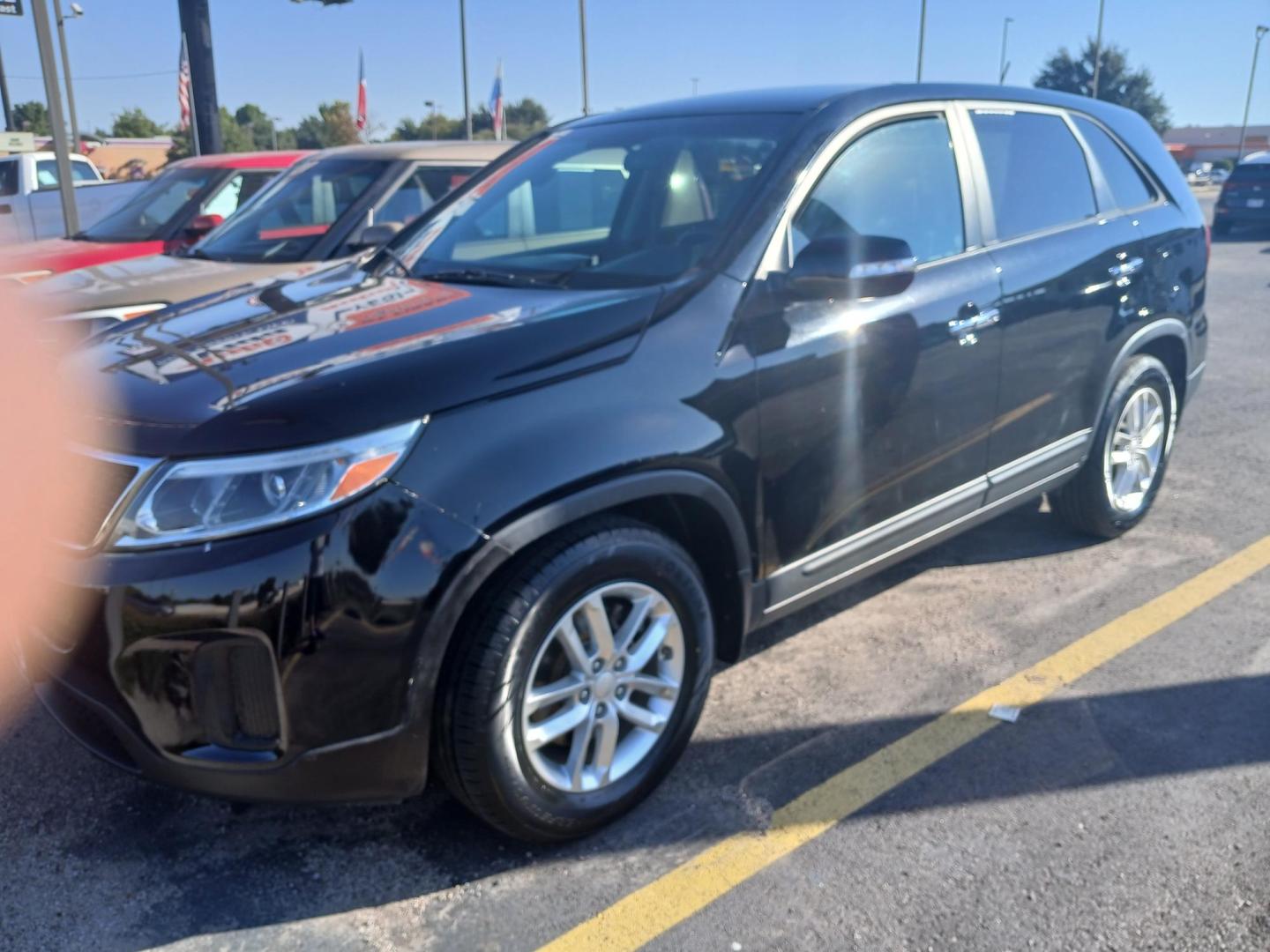 2014 BLACK Kia Sorento LX 2WD (5XYKT3A64EG) with an 2.4L L4 DOHC 16V engine, 6-Speed Automatic transmission, located at 420 I-35E, Lancaster, TX, 75146, (469) 297-4144, 32.593929, -96.823685 - Photo#0