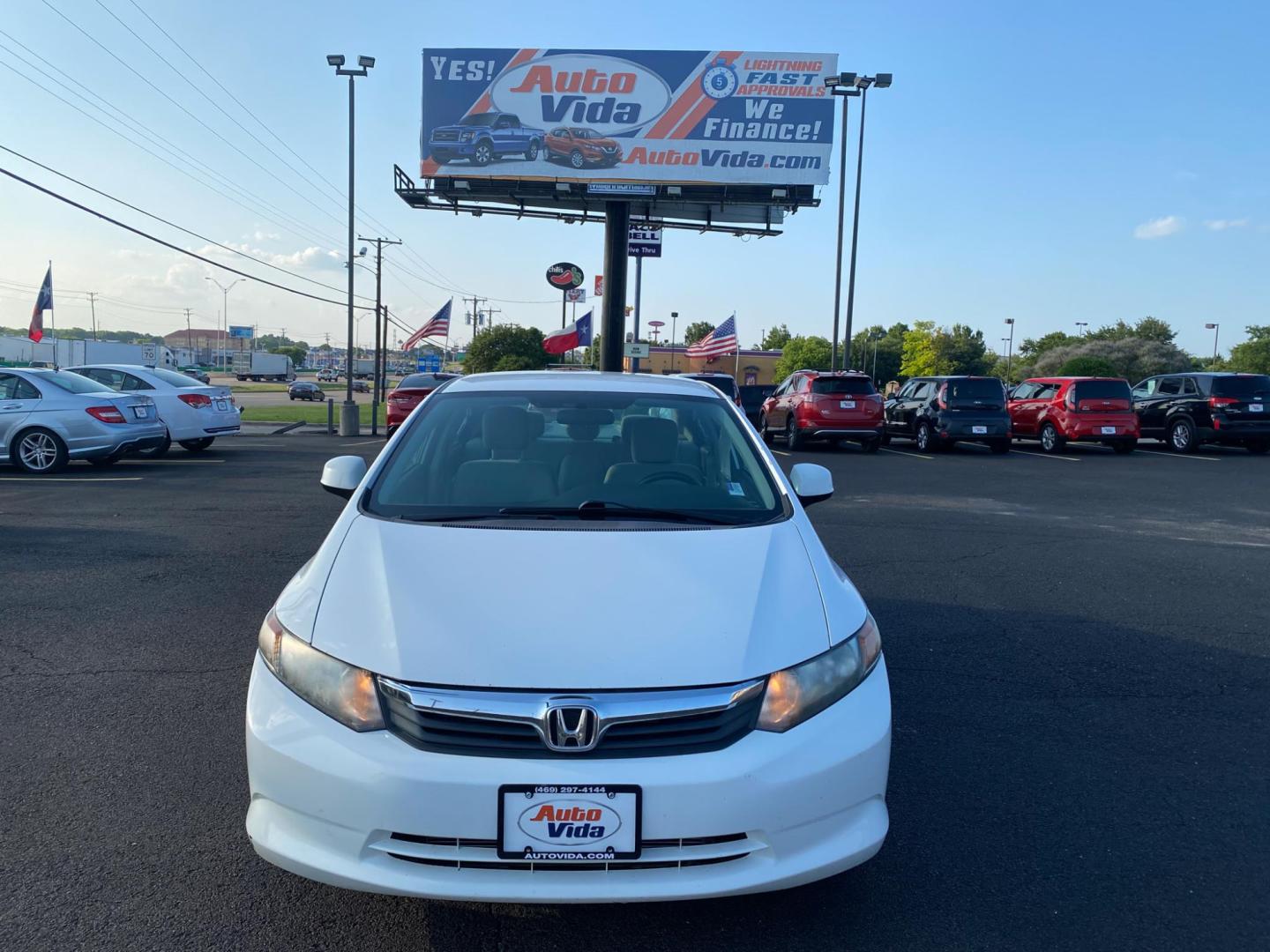 2012 WHITE Honda Civic HF Sedan 5-Speed AT (2HGFB2F61CH) with an 1.8L L4 SOHC 16V engine, 5-Speed Automatic transmission, located at 420 I-35E, Lancaster, TX, 75146, (469) 297-4144, 32.593929, -96.823685 - Photo#0