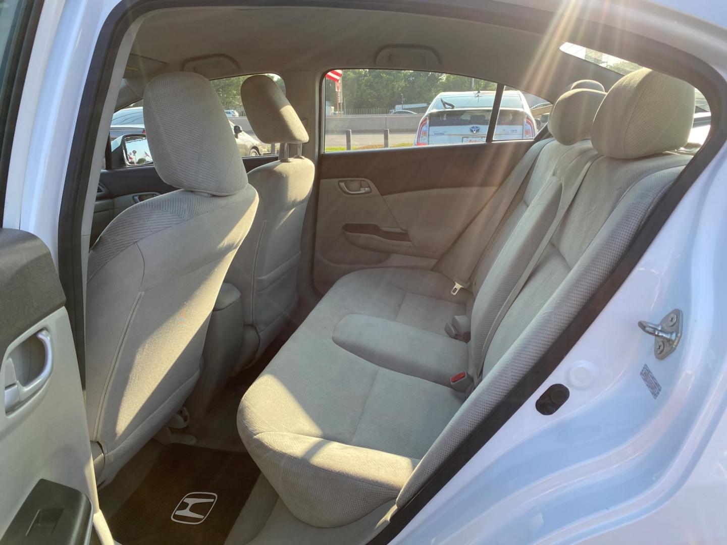 2012 WHITE Honda Civic HF Sedan 5-Speed AT (2HGFB2F61CH) with an 1.8L L4 SOHC 16V engine, 5-Speed Automatic transmission, located at 420 I-35E, Lancaster, TX, 75146, (469) 297-4144, 32.593929, -96.823685 - Photo#9