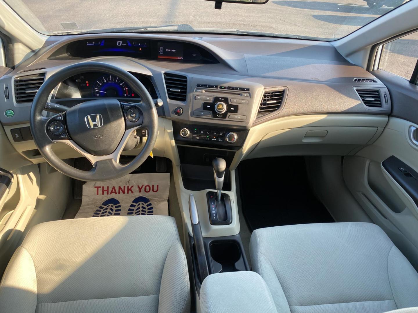 2012 WHITE Honda Civic HF Sedan 5-Speed AT (2HGFB2F61CH) with an 1.8L L4 SOHC 16V engine, 5-Speed Automatic transmission, located at 420 I-35E, Lancaster, TX, 75146, (469) 297-4144, 32.593929, -96.823685 - Photo#10