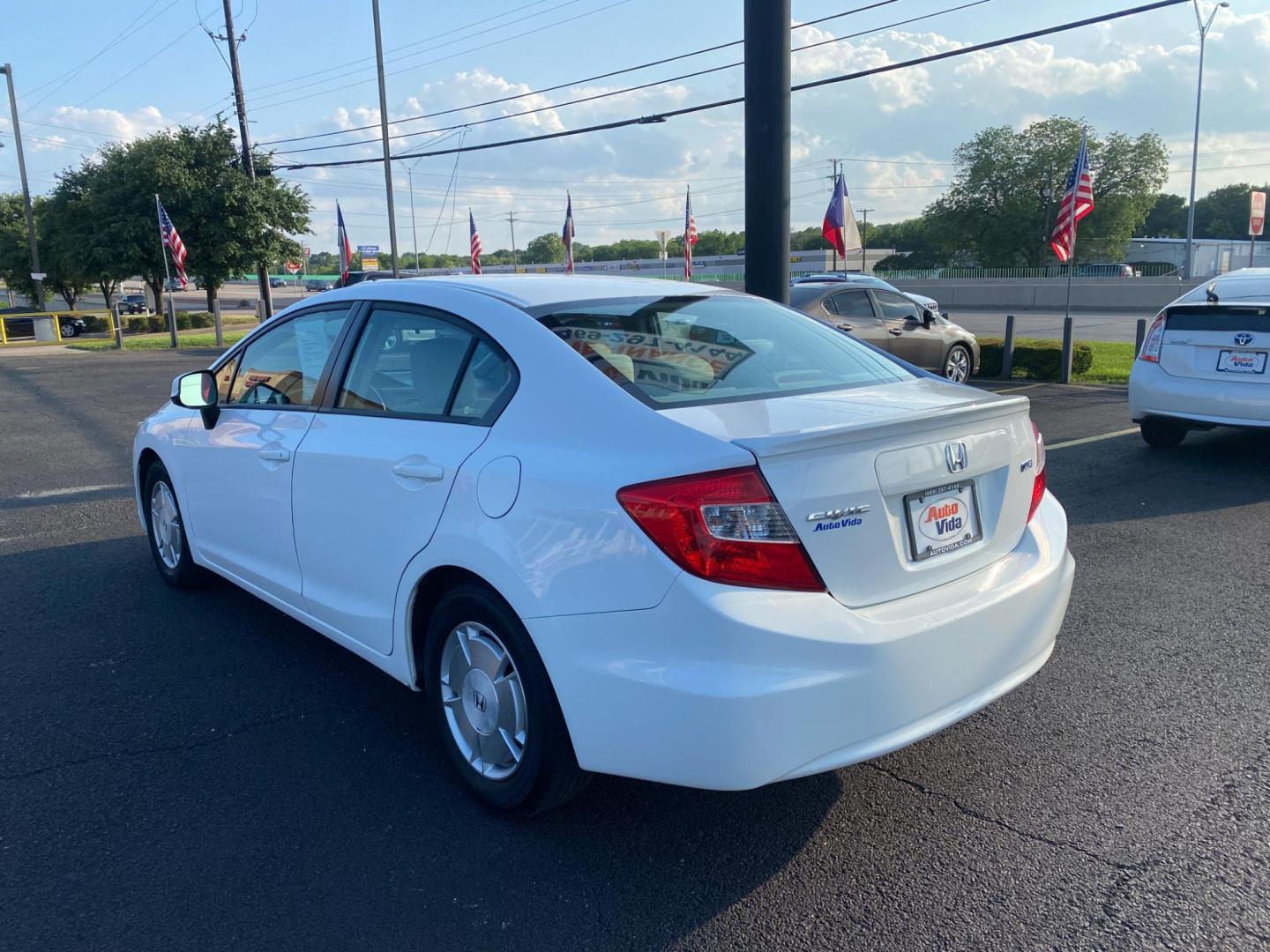 2012 WHITE Honda Civic HF Sedan 5-Speed AT (2HGFB2F61CH) with an 1.8L L4 SOHC 16V engine, 5-Speed Automatic transmission, located at 420 I-35E, Lancaster, TX, 75146, (469) 297-4144, 32.593929, -96.823685 - Photo#3