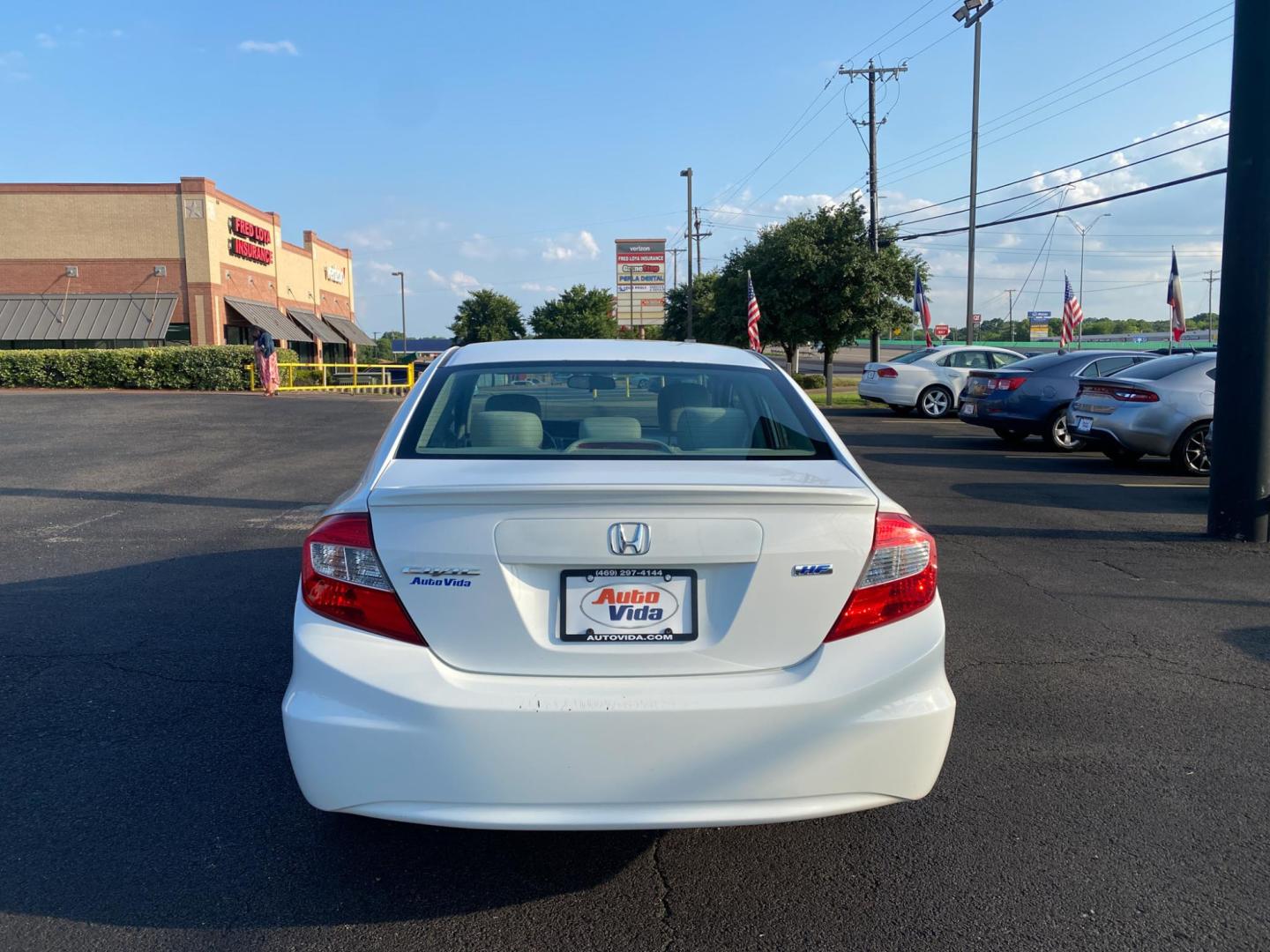 2012 WHITE Honda Civic HF Sedan 5-Speed AT (2HGFB2F61CH) with an 1.8L L4 SOHC 16V engine, 5-Speed Automatic transmission, located at 420 I-35E, Lancaster, TX, 75146, (469) 297-4144, 32.593929, -96.823685 - Photo#4