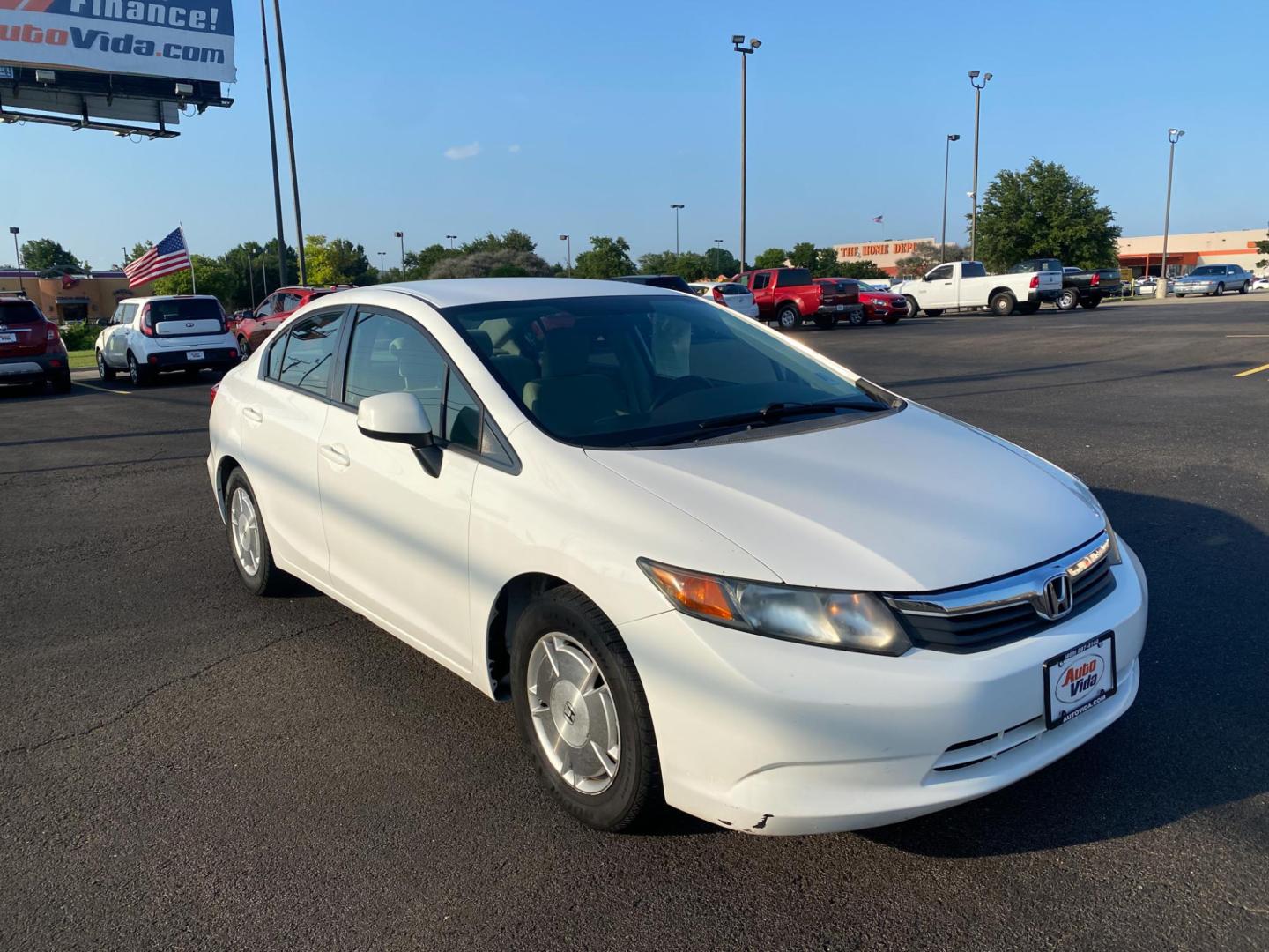 2012 WHITE Honda Civic HF Sedan 5-Speed AT (2HGFB2F61CH) with an 1.8L L4 SOHC 16V engine, 5-Speed Automatic transmission, located at 420 I-35E, Lancaster, TX, 75146, (469) 297-4144, 32.593929, -96.823685 - Photo#7