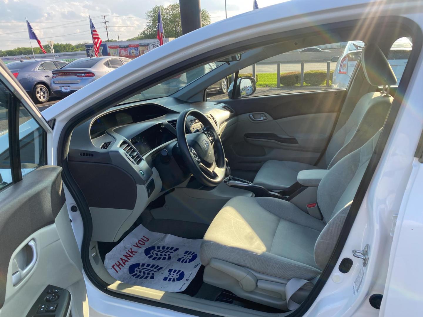 2012 WHITE Honda Civic HF Sedan 5-Speed AT (2HGFB2F61CH) with an 1.8L L4 SOHC 16V engine, 5-Speed Automatic transmission, located at 420 I-35E, Lancaster, TX, 75146, (469) 297-4144, 32.593929, -96.823685 - Photo#8