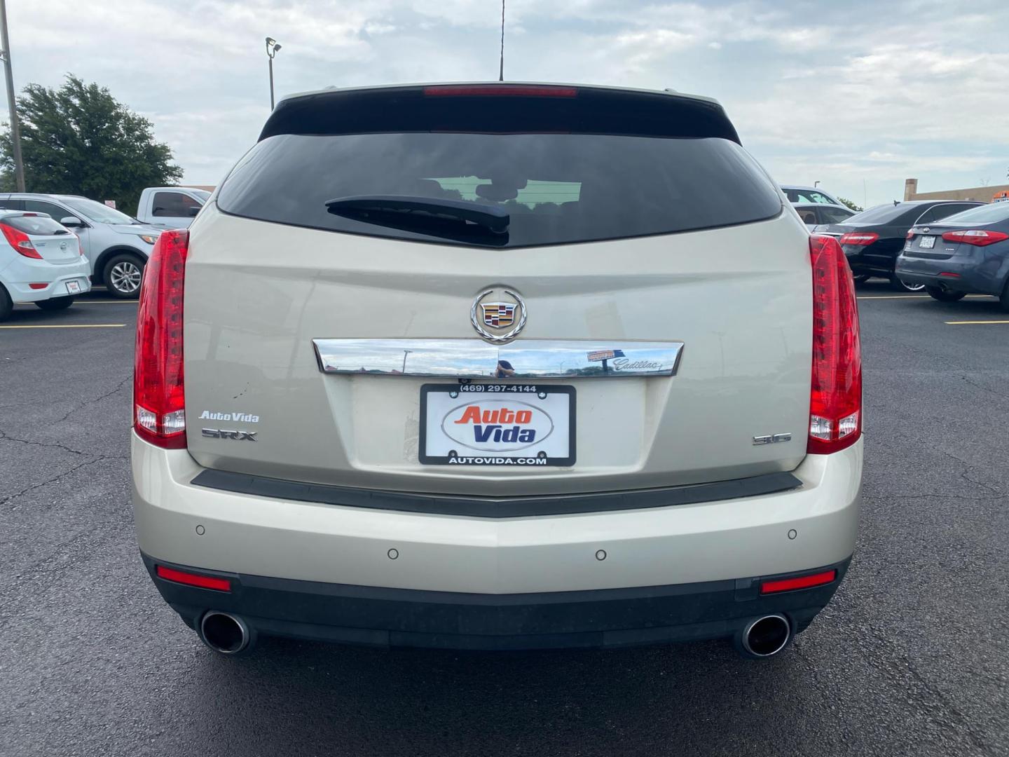 2015 TAN Cadillac SRX Luxury Collection FWD (3GYFNBE30FS) with an 3.6L V6 DOHC 24V FFV engine, 6-Speed Automatic transmission, located at 420 I-35E, Lancaster, TX, 75146, (469) 297-4144, 32.593929, -96.823685 - Photo#3