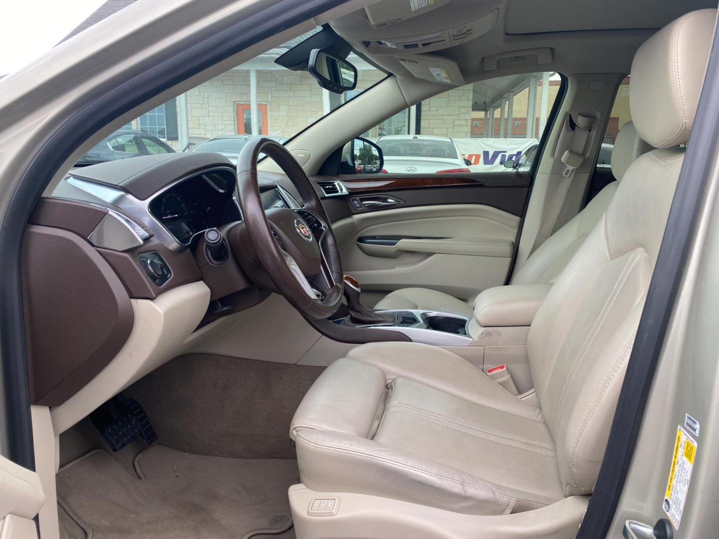 2015 TAN Cadillac SRX Luxury Collection FWD (3GYFNBE30FS) with an 3.6L V6 DOHC 24V FFV engine, 6-Speed Automatic transmission, located at 420 I-35E, Lancaster, TX, 75146, (469) 297-4144, 32.593929, -96.823685 - Photo#6