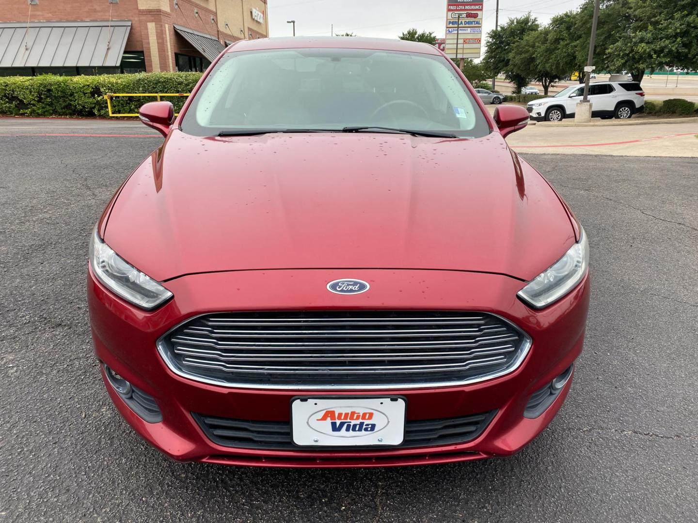 2013 RED Ford Fusion SE (3FA6P0HRXDR) with an 1.6L L4 DOHC 16V engine, located at 420 I-35E, Lancaster, TX, 75146, (469) 297-4144, 32.593929, -96.823685 - Photo#0