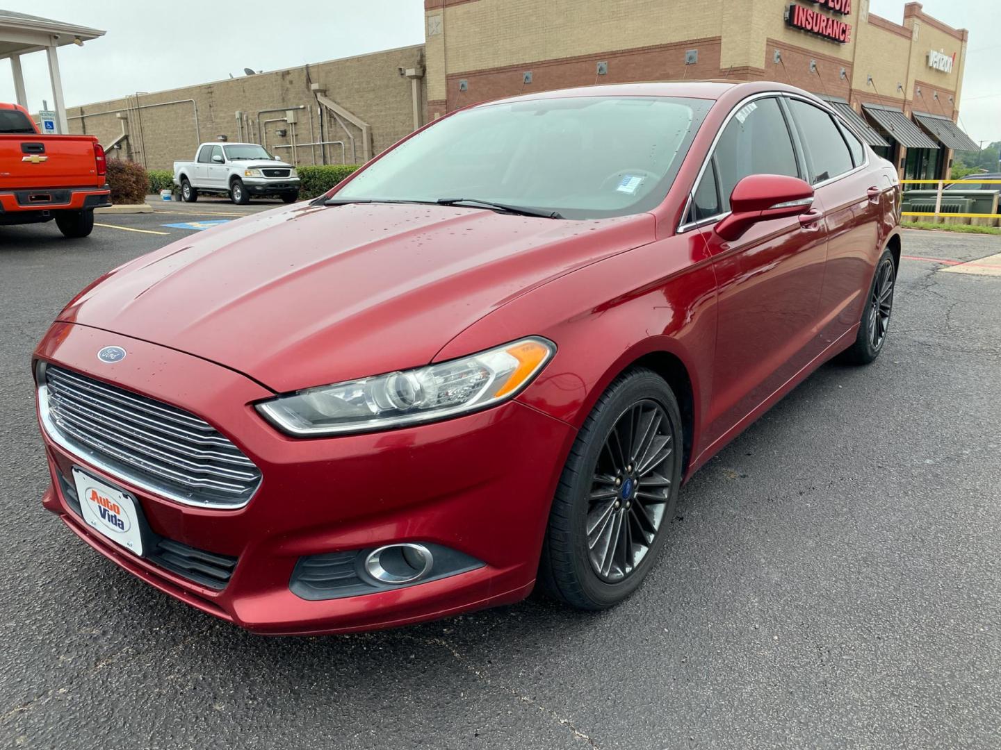 2013 RED Ford Fusion SE (3FA6P0HRXDR) with an 1.6L L4 DOHC 16V engine, located at 420 I-35E, Lancaster, TX, 75146, (469) 297-4144, 32.593929, -96.823685 - Photo#1