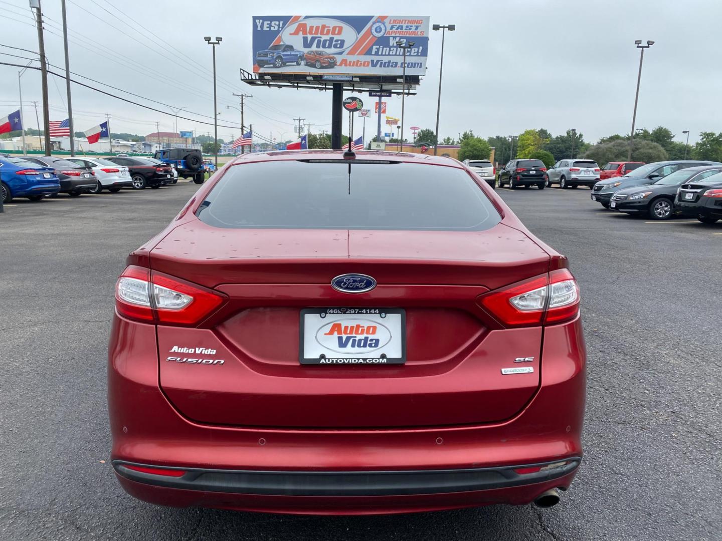 2013 RED Ford Fusion SE (3FA6P0HRXDR) with an 1.6L L4 DOHC 16V engine, located at 420 I-35E, Lancaster, TX, 75146, (469) 297-4144, 32.593929, -96.823685 - Photo#3