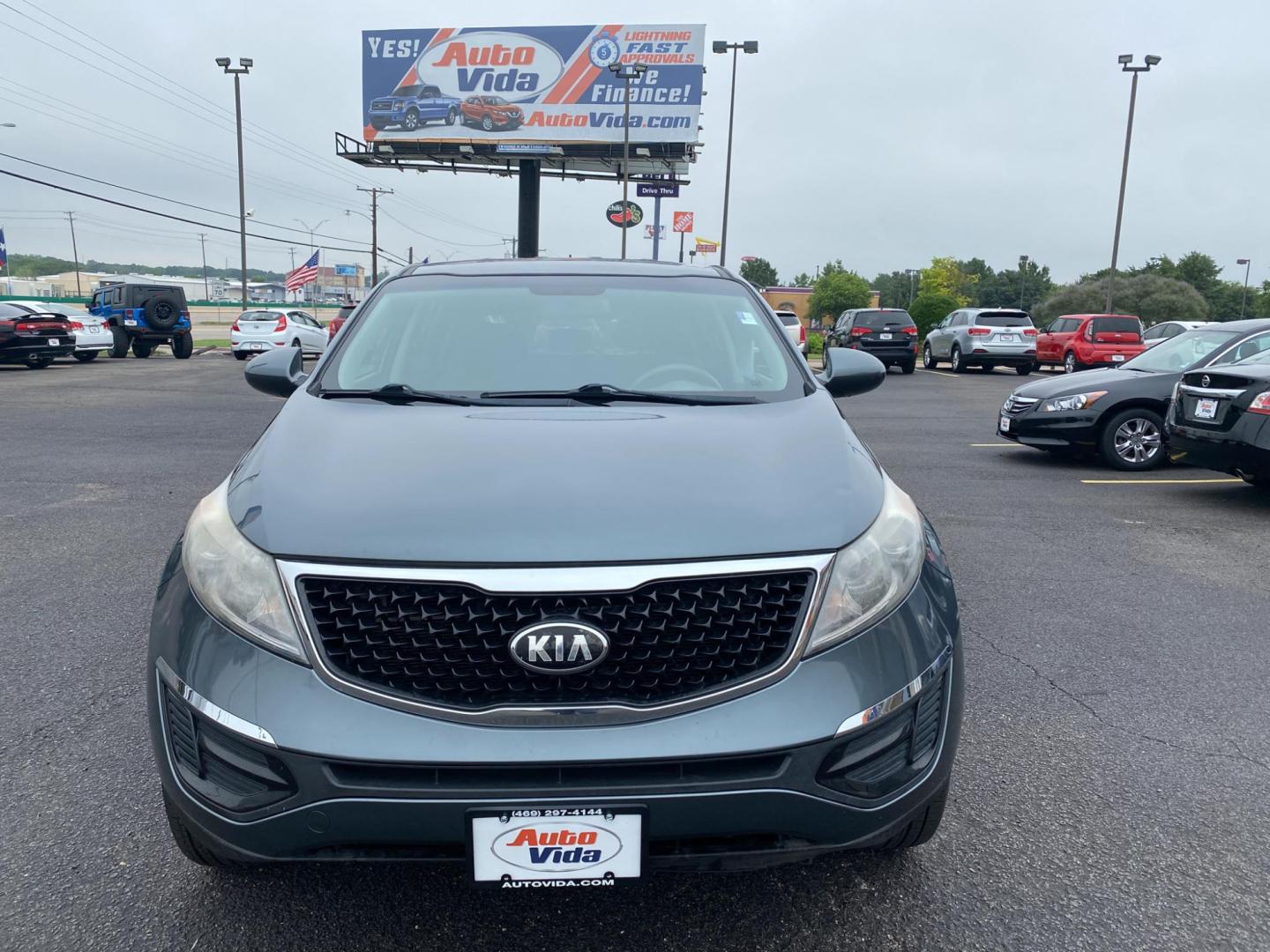 2014 GREEN Kia Sportage LX FWD (KNDPB3AC8E7) with an 2.4L V6 DOHC 24V engine, 6-Speed Automatic transmission, located at 420 I-35E, Lancaster, TX, 75146, (469) 297-4144, 32.593929, -96.823685 - Photo#0