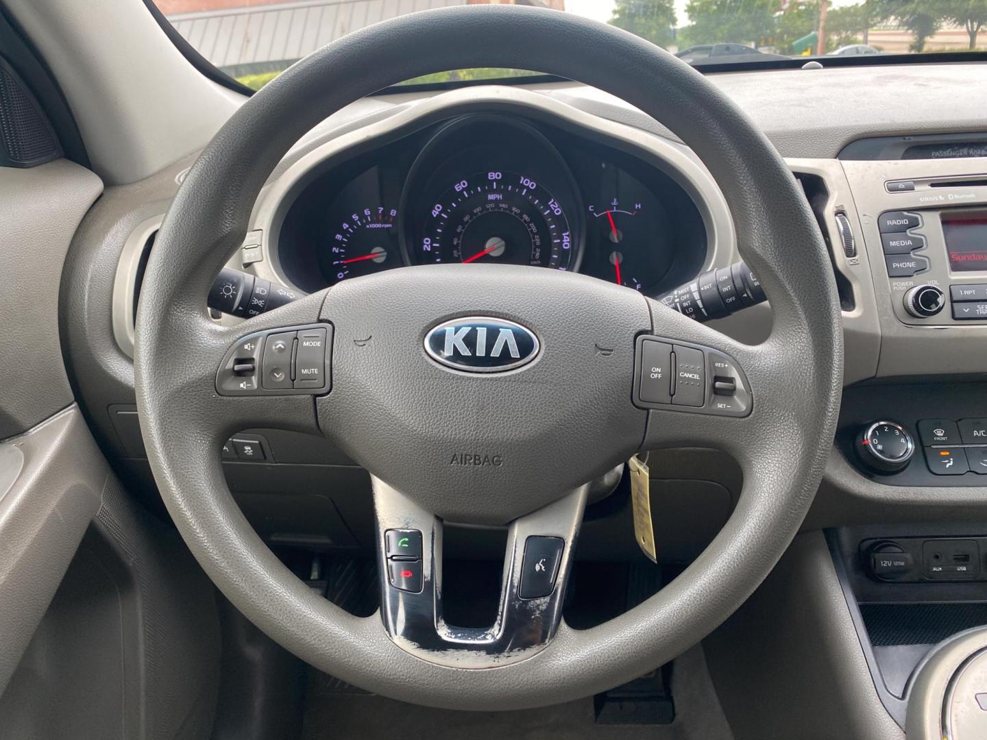 2014 GREEN Kia Sportage LX FWD (KNDPB3AC8E7) with an 2.4L V6 DOHC 24V engine, 6-Speed Automatic transmission, located at 420 I-35E, Lancaster, TX, 75146, (469) 297-4144, 32.593929, -96.823685 - Photo#11