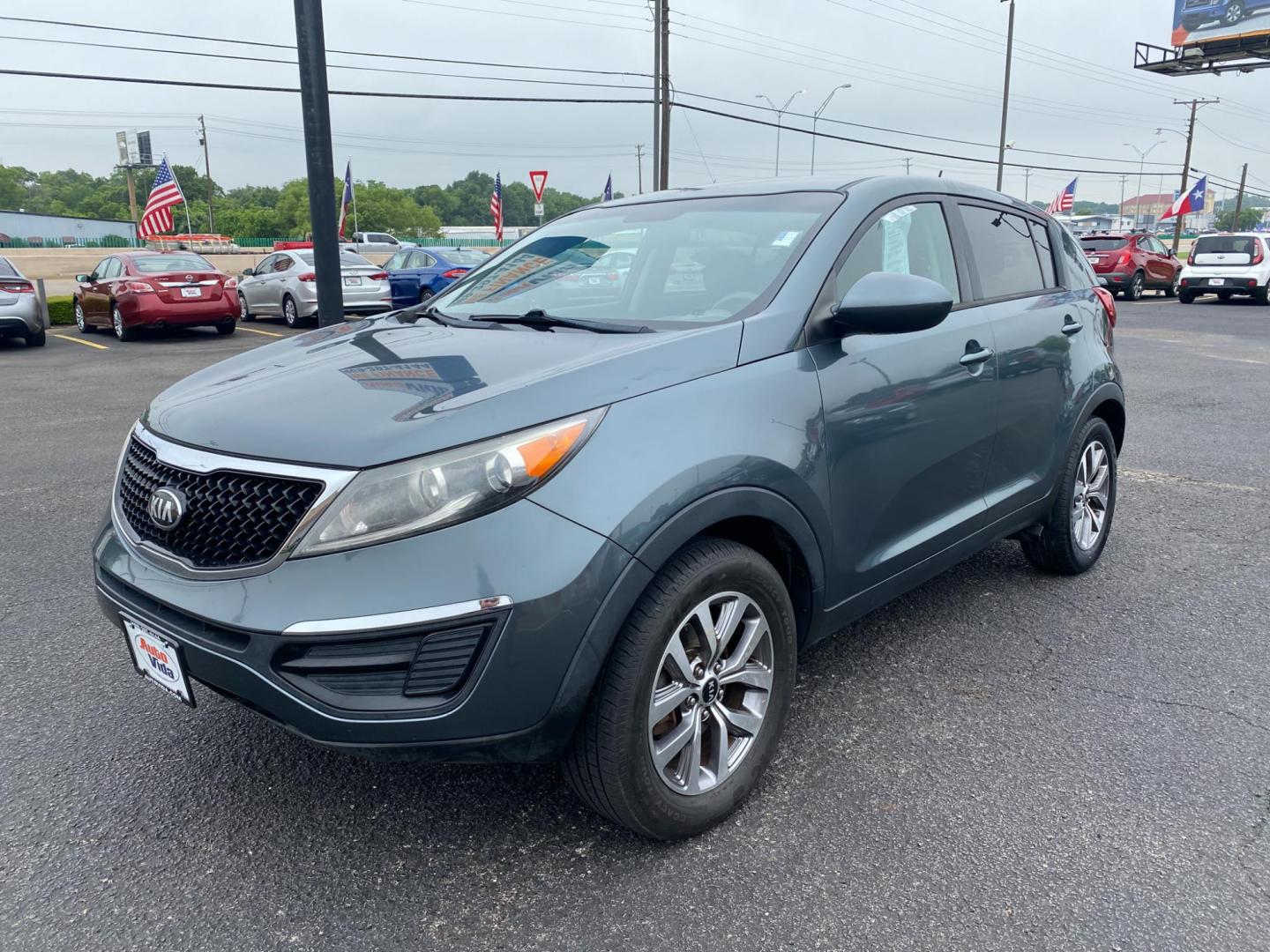 2014 GREEN Kia Sportage LX FWD (KNDPB3AC8E7) with an 2.4L V6 DOHC 24V engine, 6-Speed Automatic transmission, located at 420 I-35E, Lancaster, TX, 75146, (469) 297-4144, 32.593929, -96.823685 - Photo#1