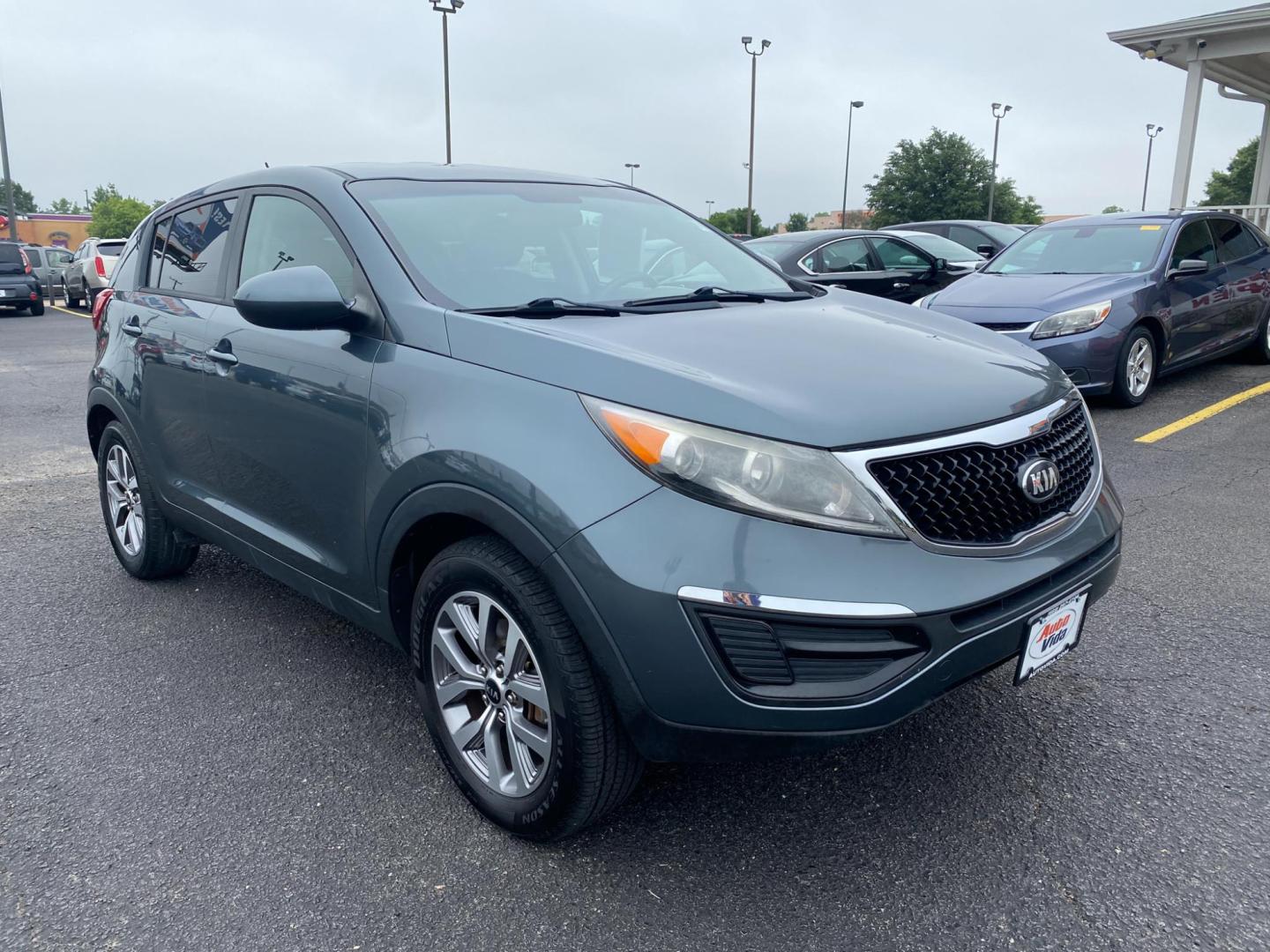 2014 GREEN Kia Sportage LX FWD (KNDPB3AC8E7) with an 2.4L V6 DOHC 24V engine, 6-Speed Automatic transmission, located at 420 I-35E, Lancaster, TX, 75146, (469) 297-4144, 32.593929, -96.823685 - Photo#5