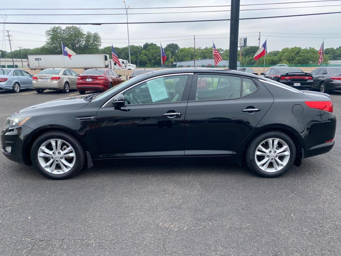 2013 BLACK Kia Optima EX (5XXGN4A72DG) with an 2.4L L4 DOHC 16V engine, 6-Speed Automatic transmission, located at 420 I-35E, Lancaster, TX, 75146, (469) 297-4144, 32.593929, -96.823685 - Photo#2