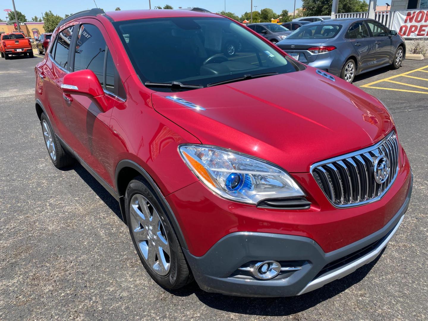 2016 MAROON Buick Encore Leather FWD (KL4CJCSB1GB) with an 1.4L L4 DOHC 16V TURBO engine, 6A transmission, located at 420 I-35E, Lancaster, TX, 75146, (469) 297-4144, 32.593929, -96.823685 - Photo#1