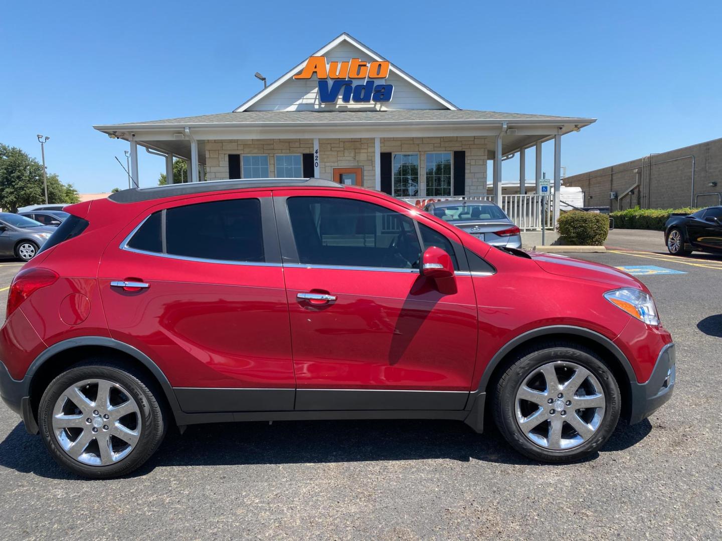 2016 MAROON Buick Encore Leather FWD (KL4CJCSB1GB) with an 1.4L L4 DOHC 16V TURBO engine, 6A transmission, located at 420 I-35E, Lancaster, TX, 75146, (469) 297-4144, 32.593929, -96.823685 - Photo#2