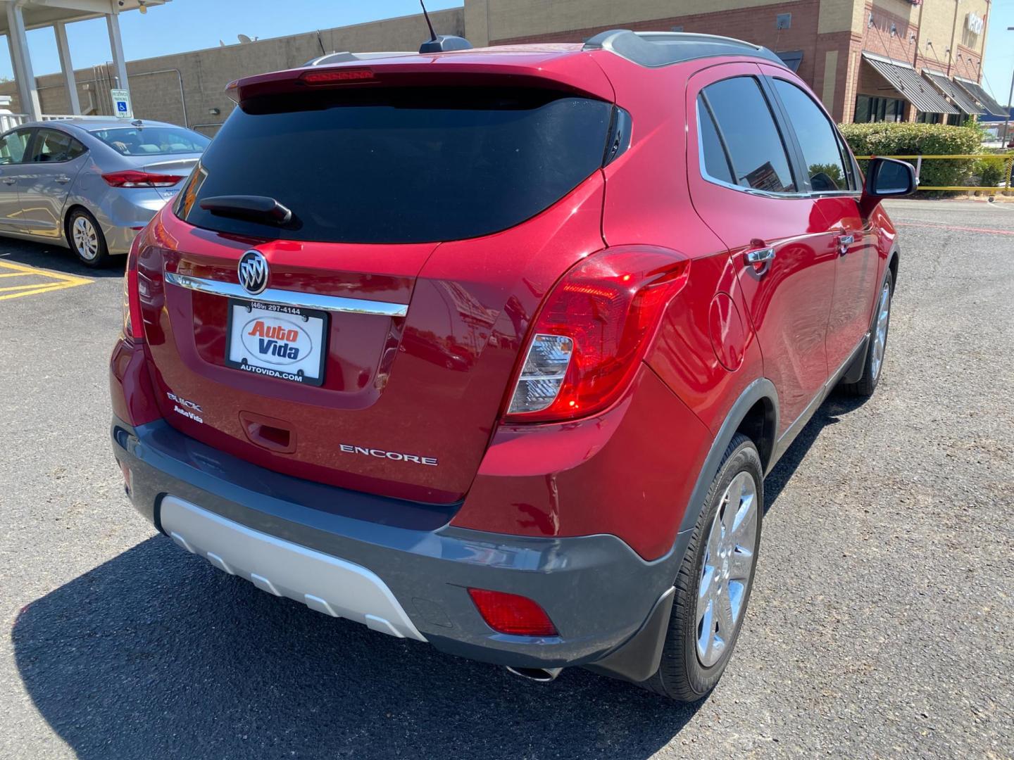 2016 MAROON Buick Encore Leather FWD (KL4CJCSB1GB) with an 1.4L L4 DOHC 16V TURBO engine, 6A transmission, located at 420 I-35E, Lancaster, TX, 75146, (469) 297-4144, 32.593929, -96.823685 - Photo#3