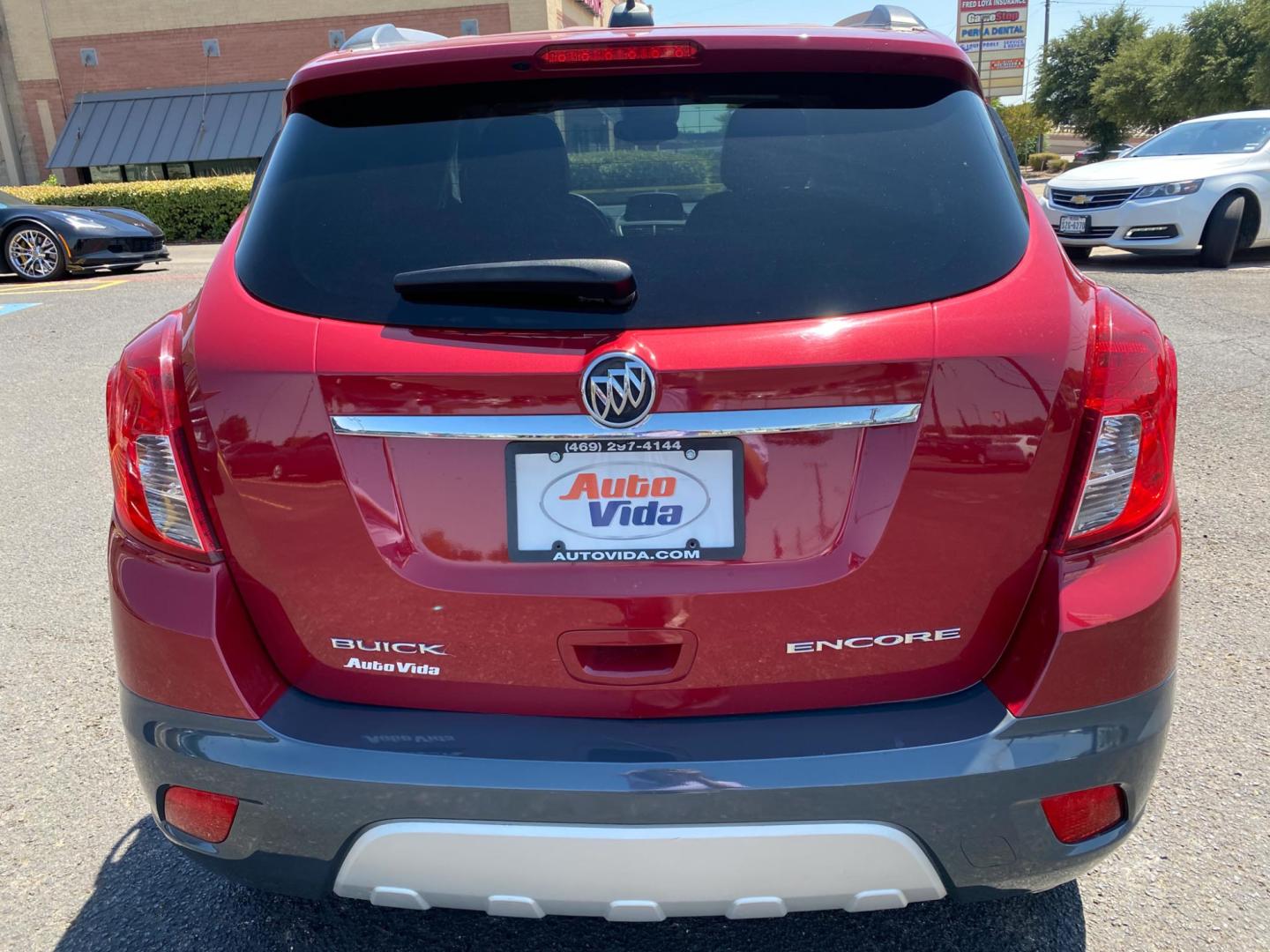 2016 MAROON Buick Encore Leather FWD (KL4CJCSB1GB) with an 1.4L L4 DOHC 16V TURBO engine, 6A transmission, located at 420 I-35E, Lancaster, TX, 75146, (469) 297-4144, 32.593929, -96.823685 - Photo#4