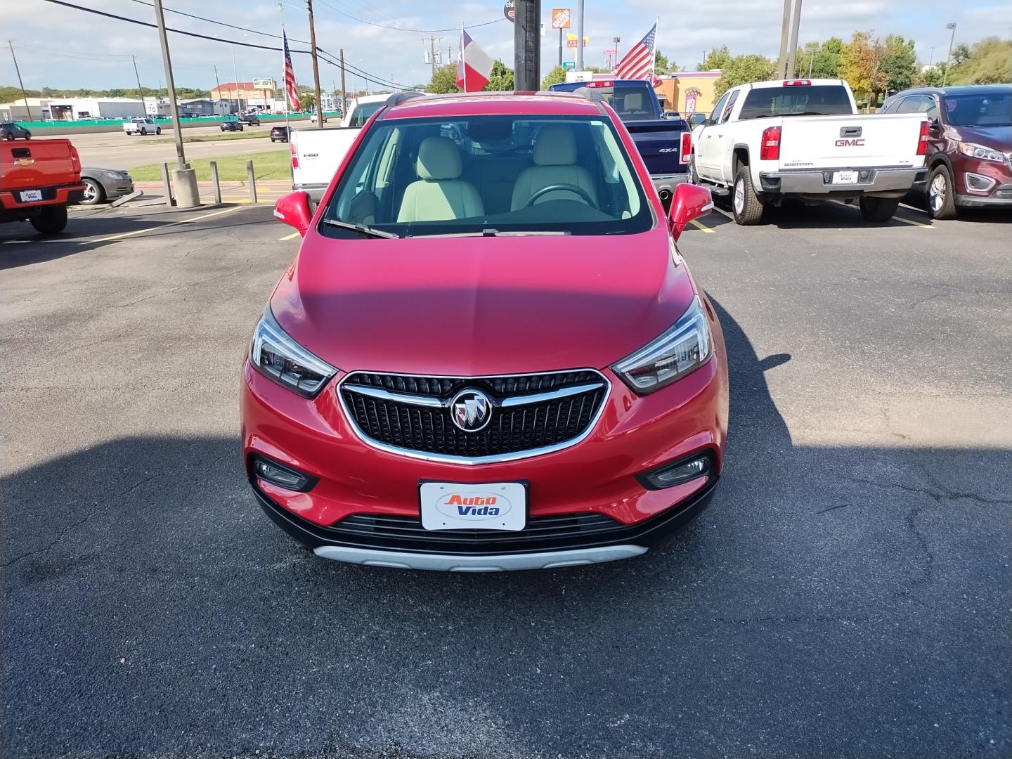 2017 RED Buick Encore Essence FWD (KL4CJCSB6HB) with an 1.4L L4 DOHC 16V TURBO engine, 6A transmission, located at 420 I-35E, Lancaster, TX, 75146, (469) 297-4144, 32.593929, -96.823685 - Photo#4