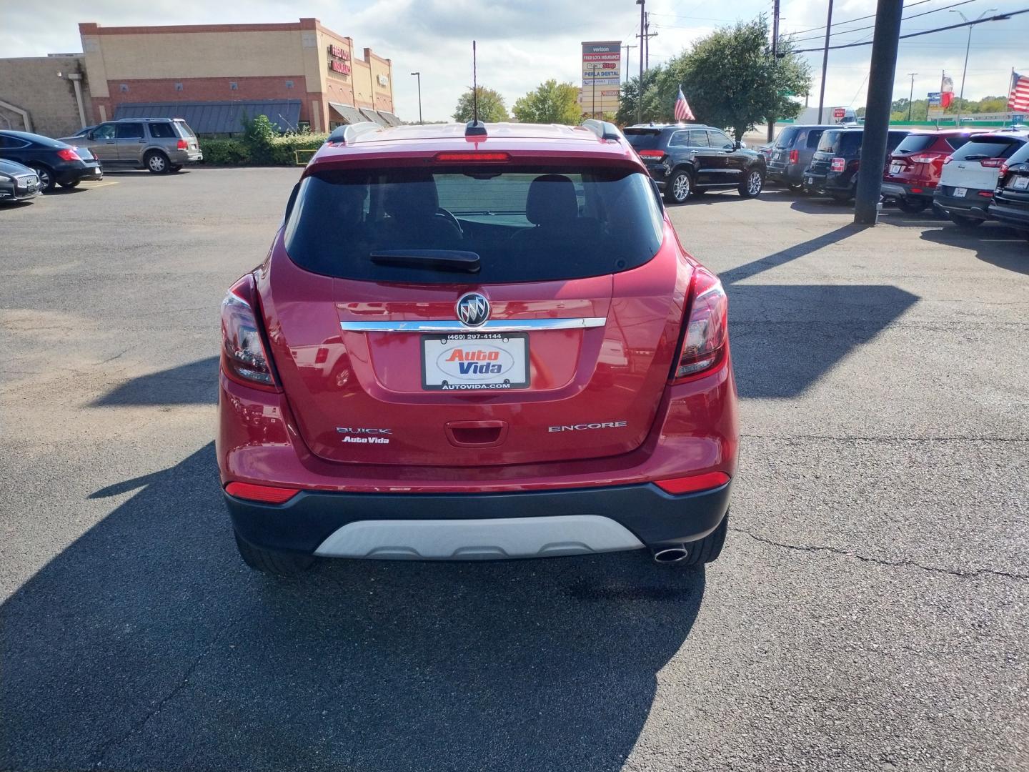 2017 RED Buick Encore Essence FWD (KL4CJCSB6HB) with an 1.4L L4 DOHC 16V TURBO engine, 6A transmission, located at 420 I-35E, Lancaster, TX, 75146, (469) 297-4144, 32.593929, -96.823685 - Photo#5