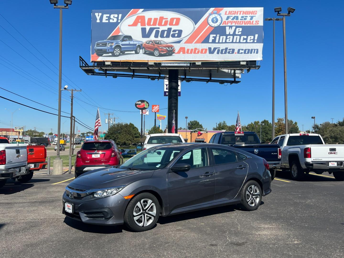 2018 GRAY Honda Civic LX Sedan CVT (2HGFC2F56JH) with an 2.0L L4 DOHC 16V engine, CVT transmission, located at 420 I-35E, Lancaster, TX, 75146, (469) 297-4144, 32.593929, -96.823685 - Photo#0