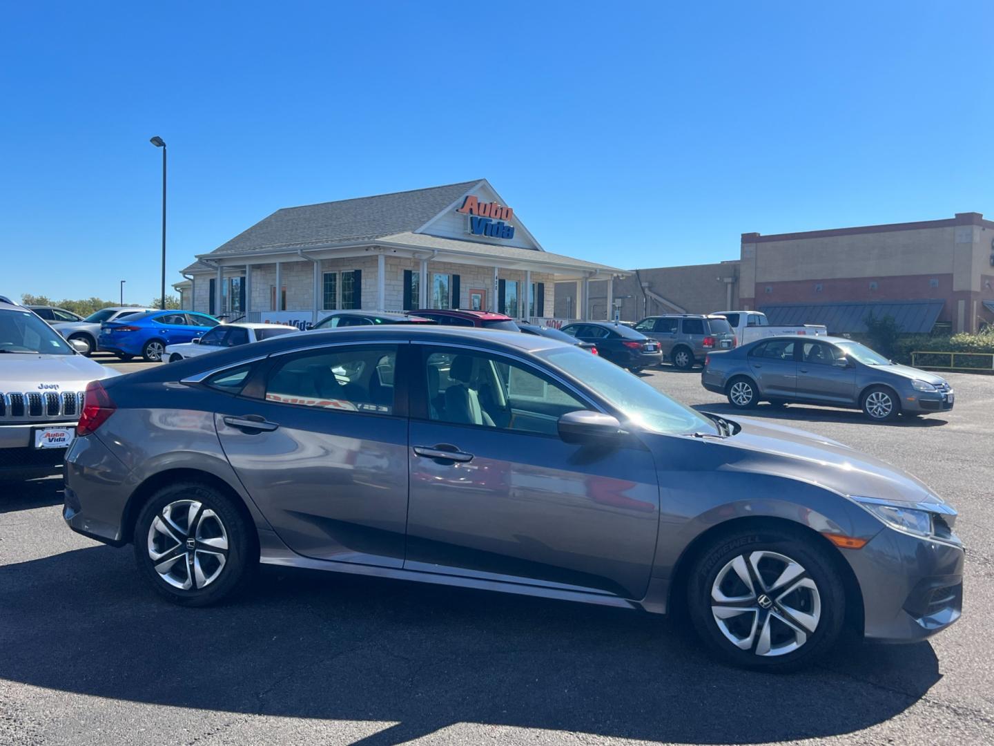 2018 GRAY Honda Civic LX Sedan CVT (2HGFC2F56JH) with an 2.0L L4 DOHC 16V engine, CVT transmission, located at 420 I-35E, Lancaster, TX, 75146, (469) 297-4144, 32.593929, -96.823685 - Photo#7