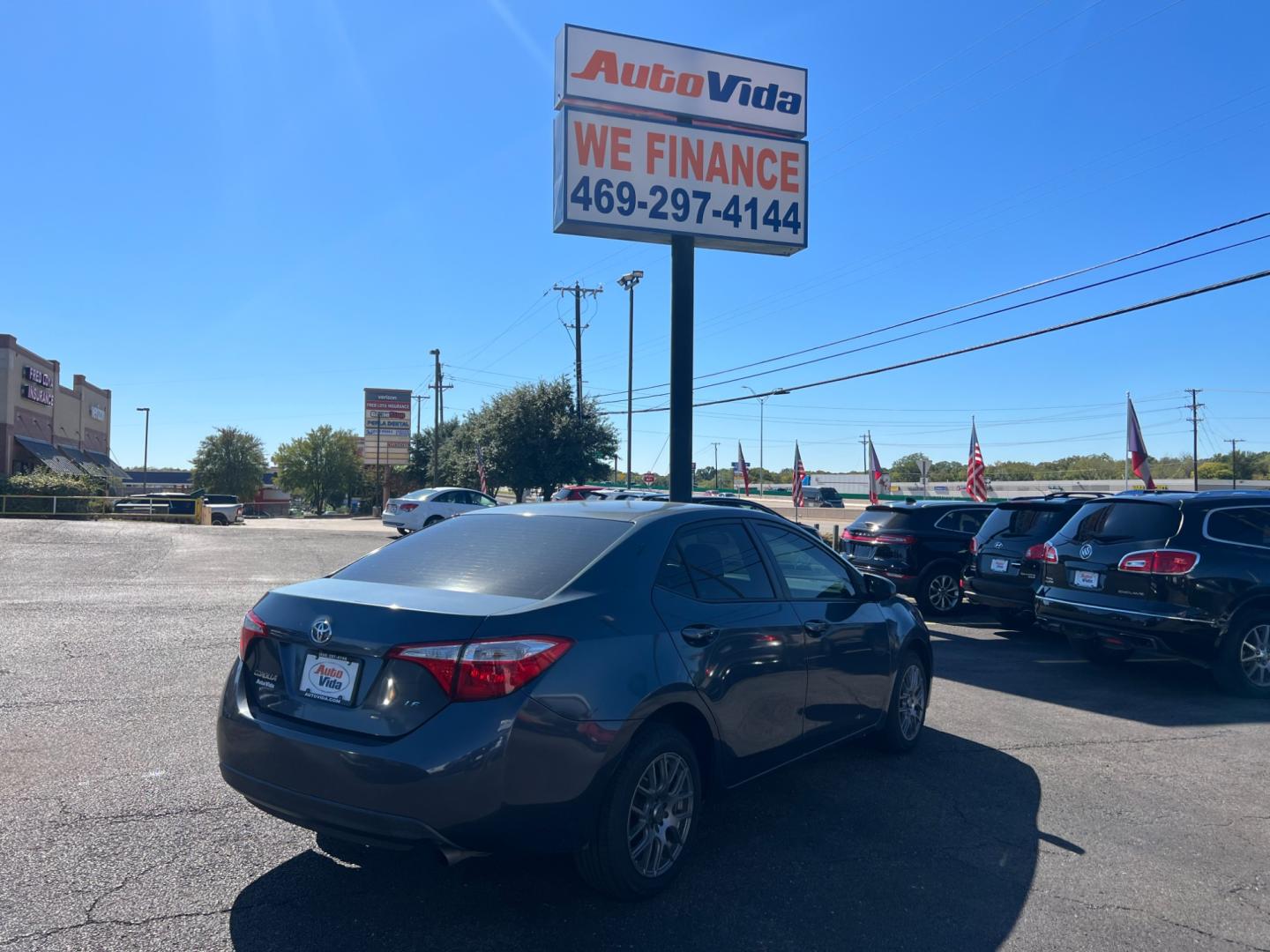 2015 BLUE Toyota Corolla L 4-Speed AT (5YFBURHE2FP) with an 1.8L L4 DOHC 16V engine, 4-Speed Automatic transmission, located at 420 I-35E, Lancaster, TX, 75146, (469) 297-4144, 32.593929, -96.823685 - Photo#6