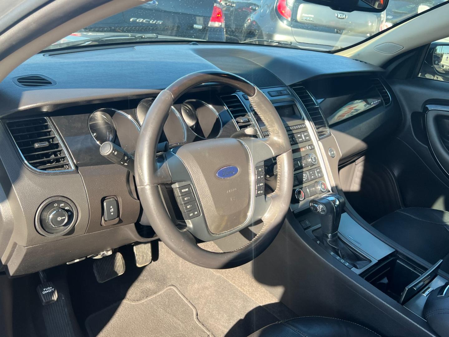 2010 GRAY Ford Taurus Limited FWD (1FAHP2FW0AG) with an 3.5L V6 DOHC 24V engine, 6-Speed Automatic transmission, located at 420 I-35E, Lancaster, TX, 75146, (469) 297-4144, 32.593929, -96.823685 - Photo#1