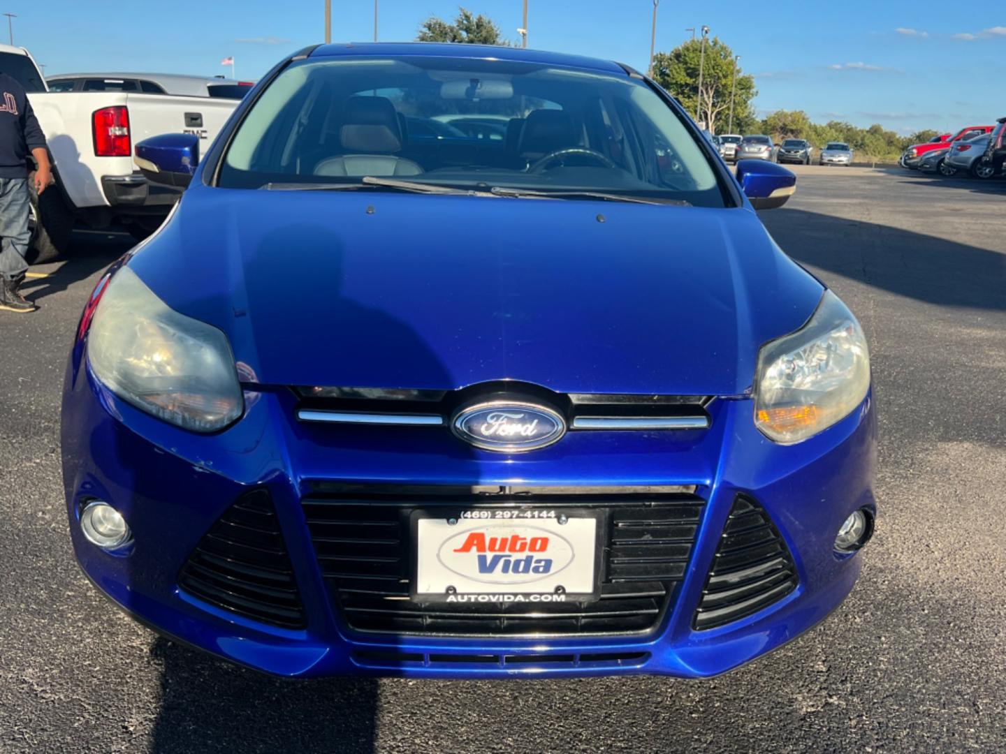 2014 BLUE Ford Focus Titanium Sedan (1FADP3J25EL) with an 2.0L L4 DOHC 16V engine, located at 420 I-35E, Lancaster, TX, 75146, (469) 297-4144, 32.593929, -96.823685 - Photo#6