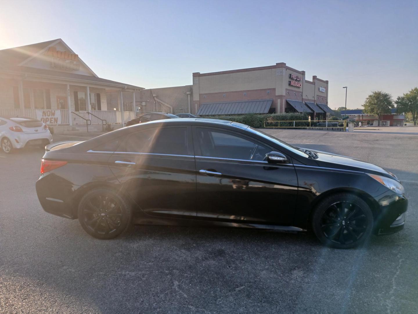 2014 BLACK Hyundai Sonata SE 2.0L TGDI (5NPEC4AB9EH) with an 2.0L L4 DOHC 16V engine, 6-Speed Automatic transmission, located at 420 I-35E, Lancaster, TX, 75146, (469) 297-4144, 32.593929, -96.823685 - Photo#0