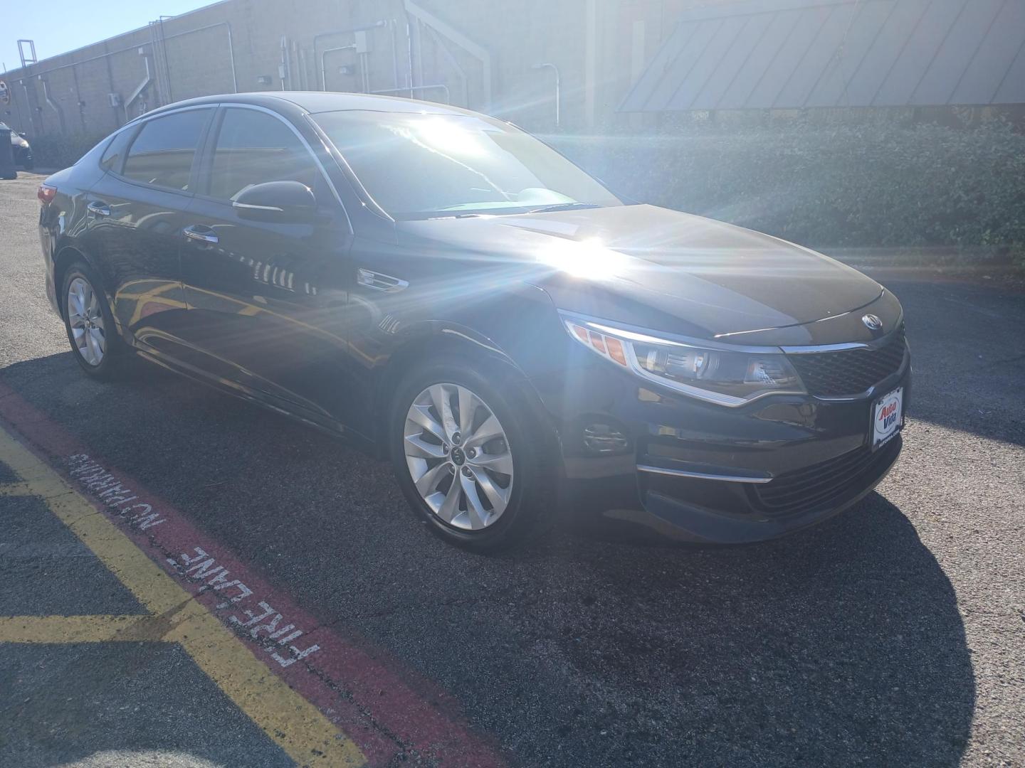 2016 BLACK Kia Optima LX (5XXGT4L37GG) with an 2.4L L4 DOHC 16V engine, 6A transmission, located at 420 I-35E, Lancaster, TX, 75146, (469) 297-4144, 32.593929, -96.823685 - Photo#1