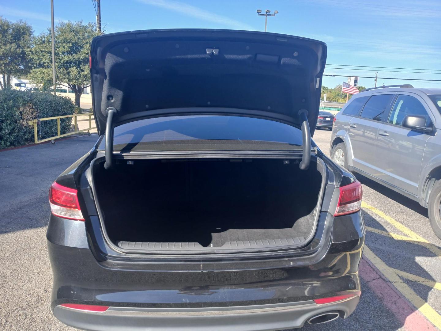 2016 BLACK Kia Optima LX (5XXGT4L37GG) with an 2.4L L4 DOHC 16V engine, 6A transmission, located at 420 I-35E, Lancaster, TX, 75146, (469) 297-4144, 32.593929, -96.823685 - Photo#2