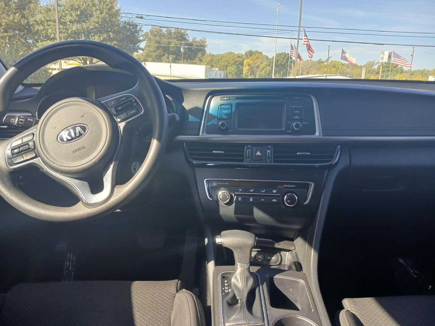 2016 BLACK Kia Optima LX (5XXGT4L37GG) with an 2.4L L4 DOHC 16V engine, 6A transmission, located at 420 I-35E, Lancaster, TX, 75146, (469) 297-4144, 32.593929, -96.823685 - Photo#3