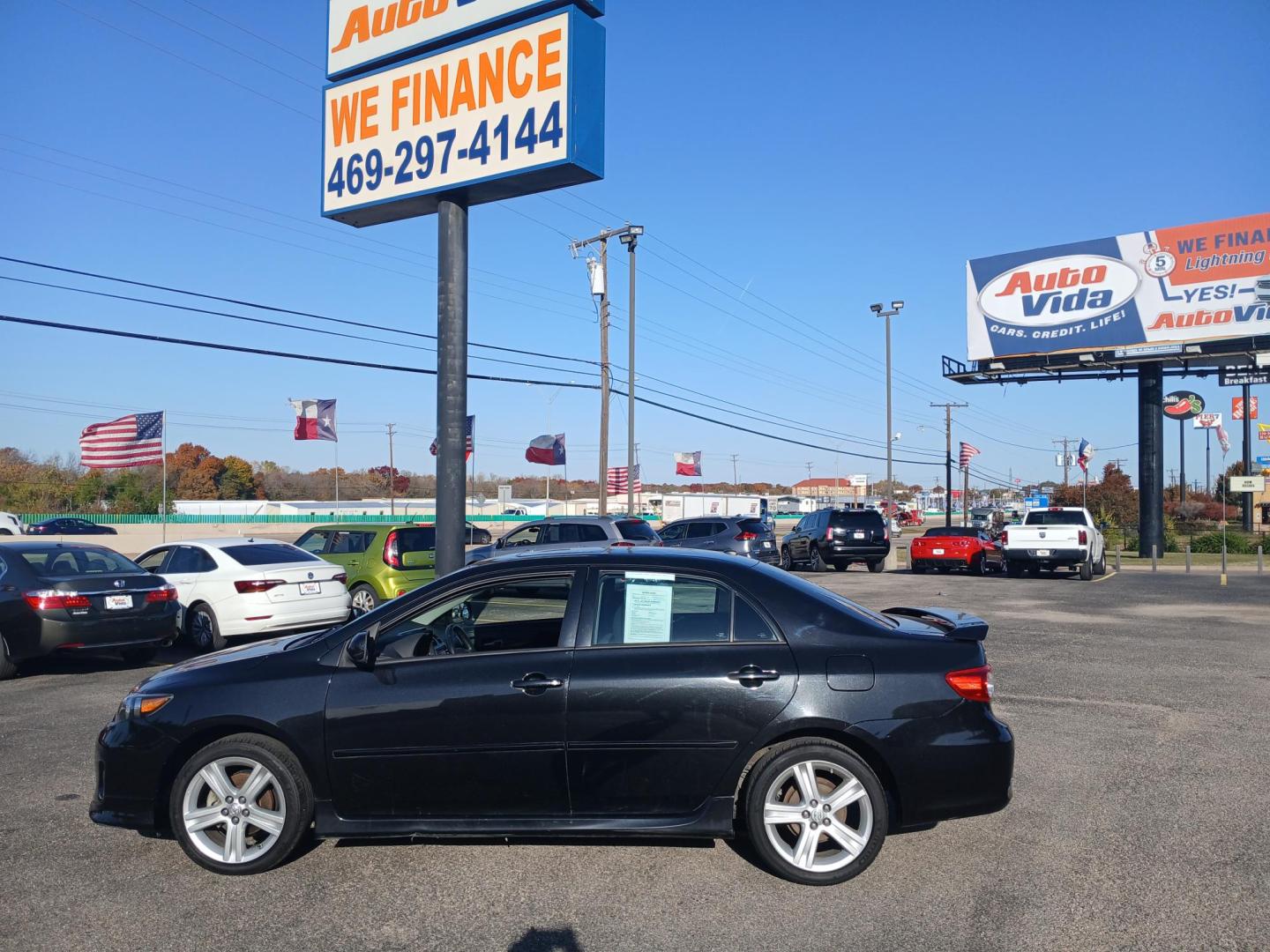 2013 BLACK Toyota Corolla LE 4-Speed AT (5YFBU4EE9DP) with an 1.8L L4 DOHC 16V engine, 4-Speed Automatic transmission, located at 420 I-35E, Lancaster, TX, 75146, (469) 297-4144, 32.593929, -96.823685 - Photo#2