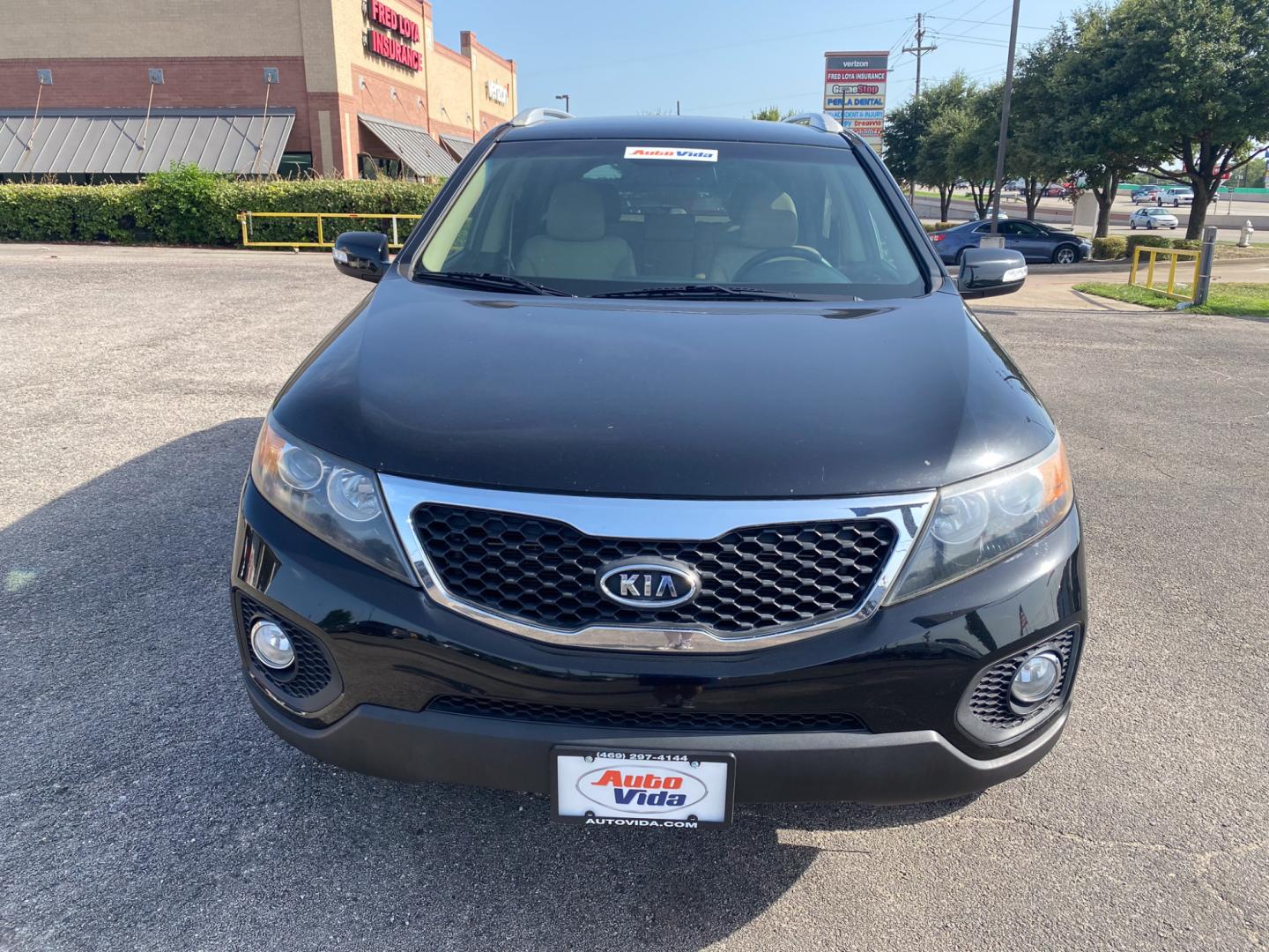 2012 BLACK Kia Sorento EX 4WD (5XYKUCA62CG) with an 2.4L L4 DOHC 16V engine, 6-Speed Automatic transmission, located at 420 I-35E, Lancaster, TX, 75146, (469) 297-4144, 32.593929, -96.823685 - Photo#0