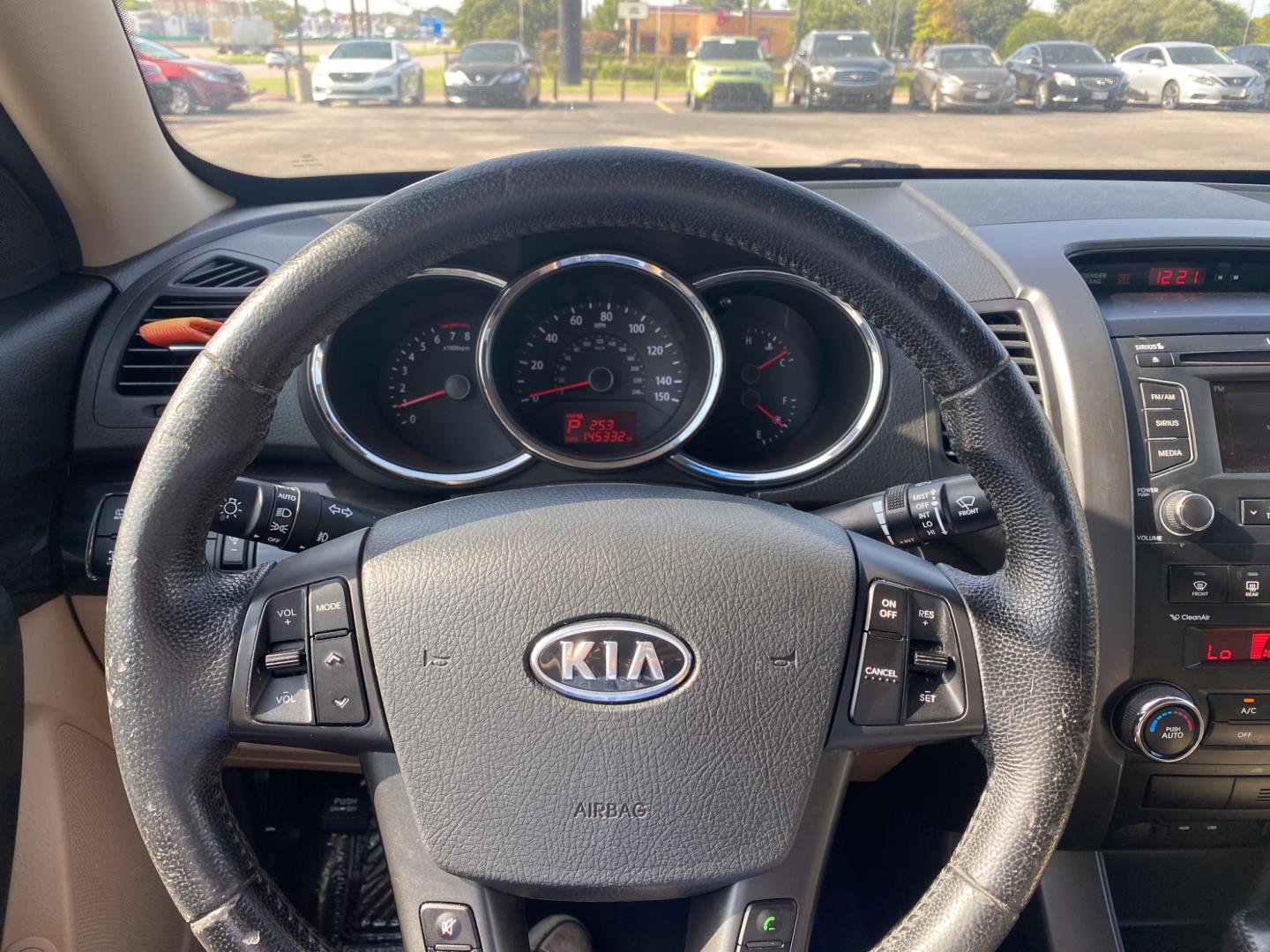 2012 BLACK Kia Sorento EX 4WD (5XYKUCA62CG) with an 2.4L L4 DOHC 16V engine, 6-Speed Automatic transmission, located at 420 I-35E, Lancaster, TX, 75146, (469) 297-4144, 32.593929, -96.823685 - Photo#13