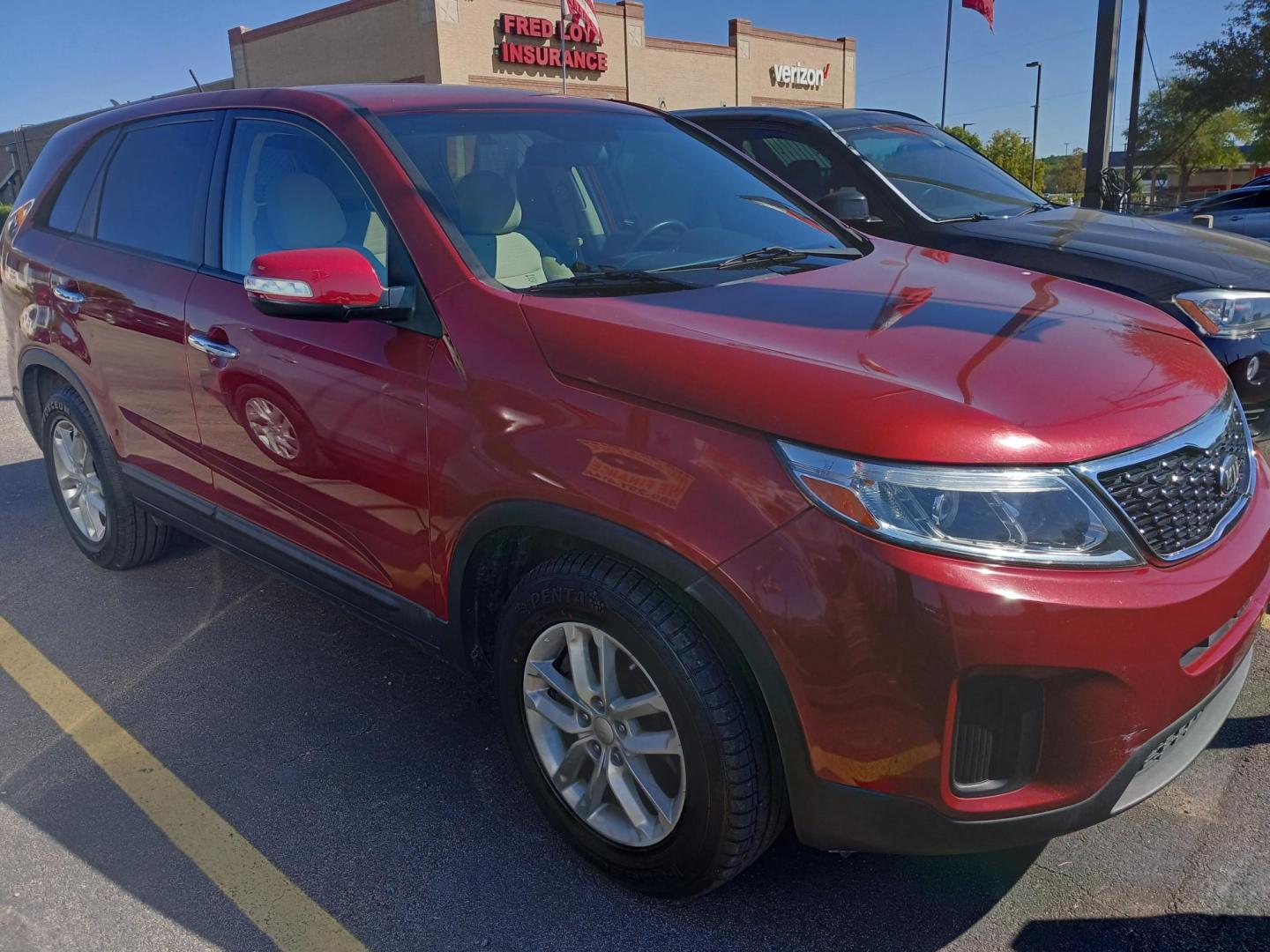 2014 RED Kia Sorento LX 2WD (5XYKT3A60EG) with an 2.4L L4 DOHC 16V engine, 6-Speed Automatic transmission, located at 420 I-35E, Lancaster, TX, 75146, (469) 297-4144, 32.593929, -96.823685 - Photo#0