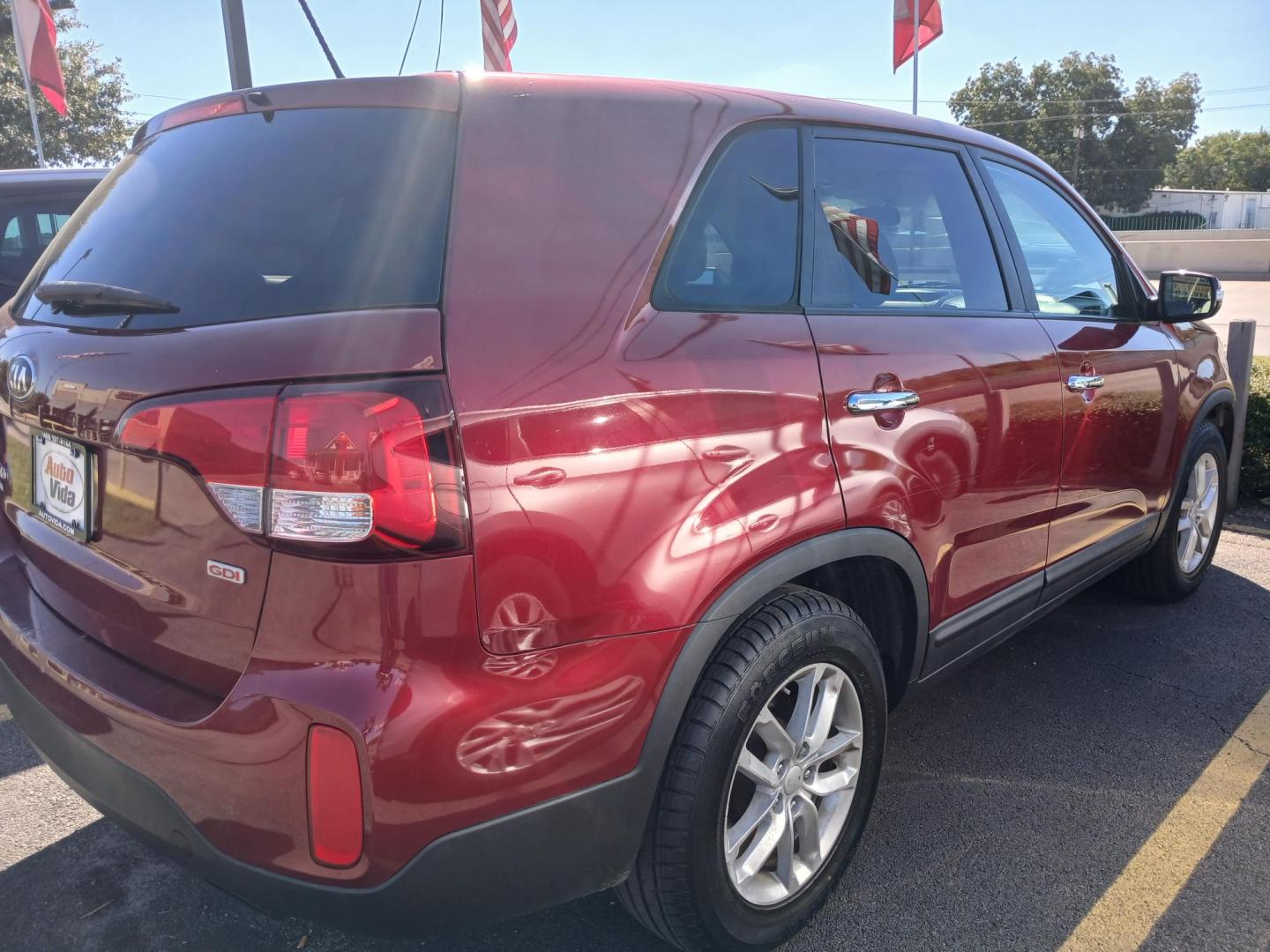 2014 RED Kia Sorento LX 2WD (5XYKT3A60EG) with an 2.4L L4 DOHC 16V engine, 6-Speed Automatic transmission, located at 420 I-35E, Lancaster, TX, 75146, (469) 297-4144, 32.593929, -96.823685 - Photo#1