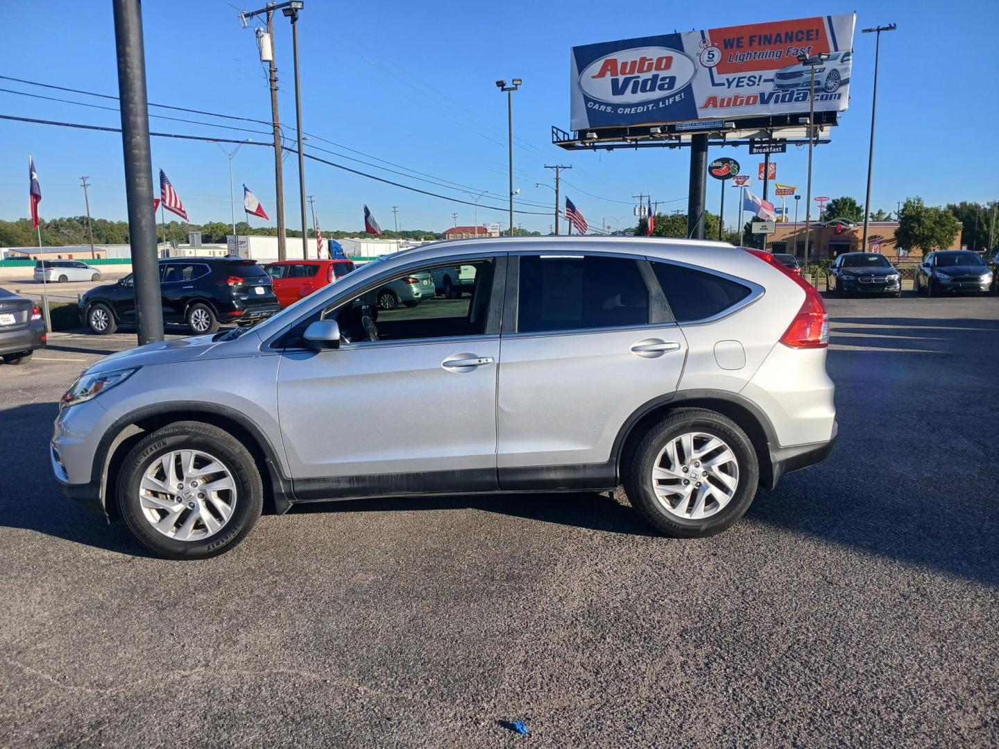 2016 SILVER Honda CR-V EX-L 2WD (2HKRM3H72GH) with an 2.4L L4 DOHC 16V engine, CVT transmission, located at 420 I-35E, Lancaster, TX, 75146, (469) 297-4144, 32.593929, -96.823685 - Photo#1