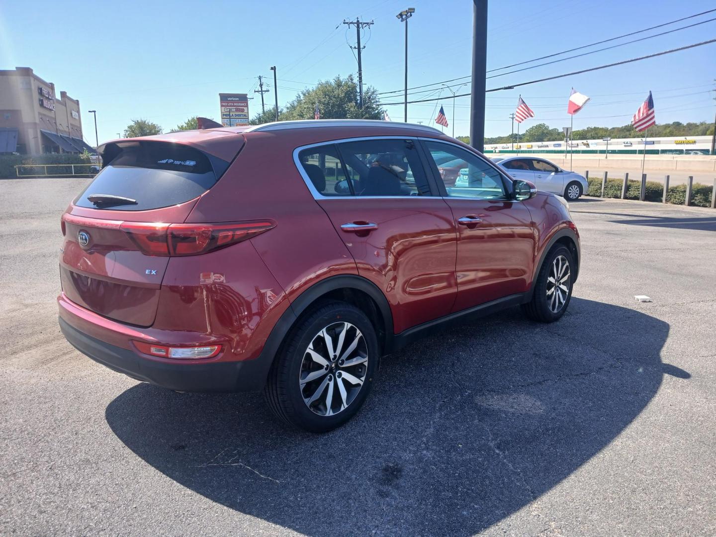 2019 RED Kia Sportage EX FWD (KNDPN3AC5K7) with an 2.4L V6 DOHC 24V engine, 6A transmission, located at 420 I-35E, Lancaster, TX, 75146, (469) 297-4144, 32.593929, -96.823685 - Photo#3