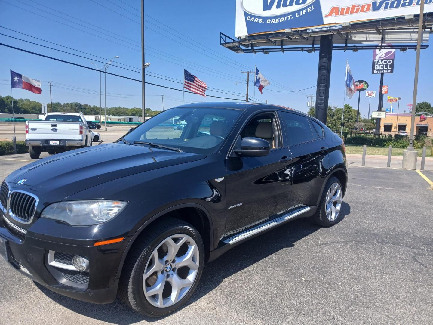 2013 BLACK BMW X6 xDrive35i (5UXFG2C5XDL) with an 3.0L L6 DOHC 24V engine, 8-Speed Automatic transmission, located at 420 I-35E, Lancaster, TX, 75146, (469) 297-4144, 32.593929, -96.823685 - Photo#0