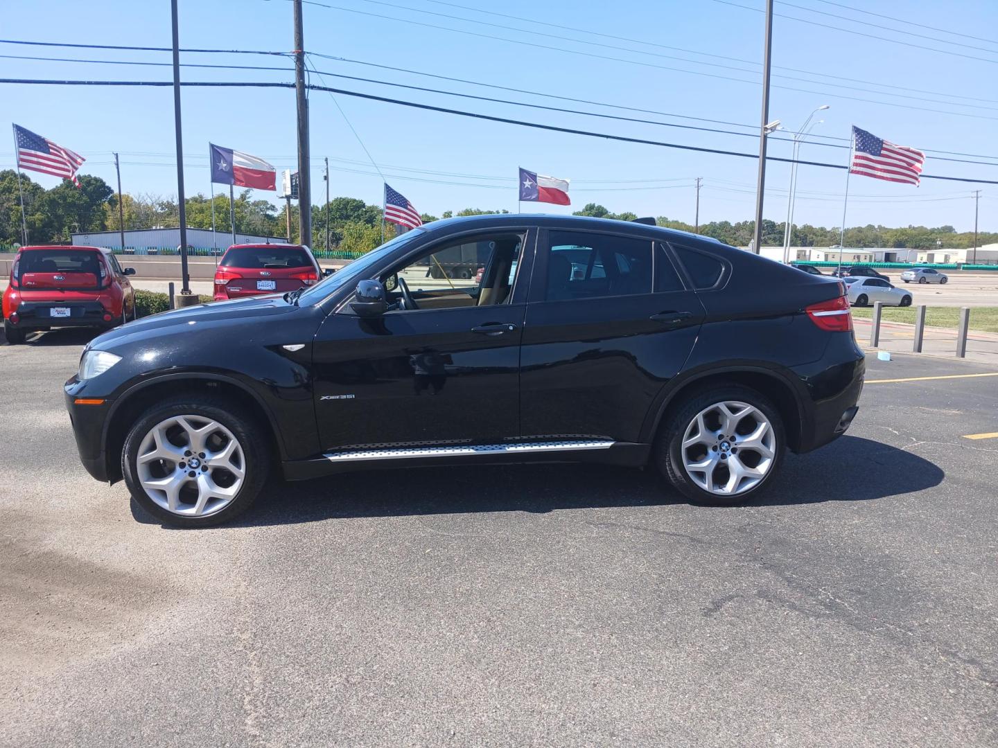 2013 BLACK BMW X6 xDrive35i (5UXFG2C5XDL) with an 3.0L L6 DOHC 24V engine, 8-Speed Automatic transmission, located at 420 I-35E, Lancaster, TX, 75146, (469) 297-4144, 32.593929, -96.823685 - Photo#1