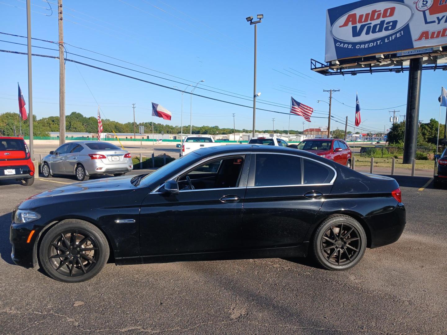 2015 BLACK BMW 5-Series 528i (WBA5A5C5XFD) with an 2.0L L4 DOHC 16V TURBO engine, 8-Speed Automatic transmission, located at 420 I-35E, Lancaster, TX, 75146, (469) 297-4144, 32.593929, -96.823685 - Photo#1