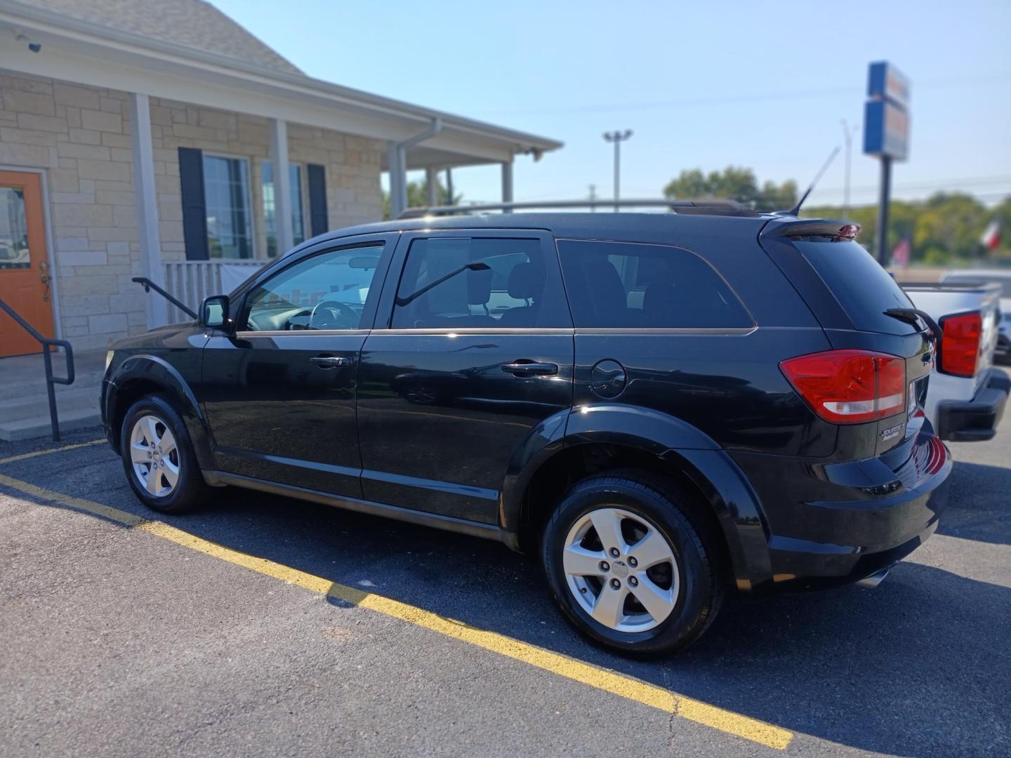 2011 BLACK Dodge Journey Mainstreet (3D4PG1FG0BT) with an 3.6L V6 DOHC 24V engine, 6-Speed Automatic transmission, located at 420 I-35E, Lancaster, TX, 75146, (469) 297-4144, 32.593929, -96.823685 - Photo#2