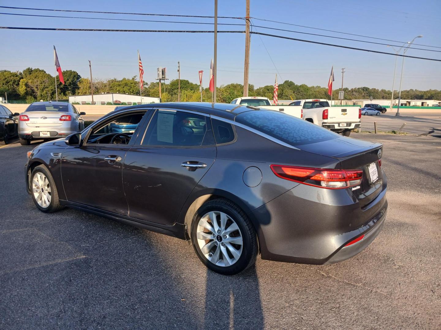 2018 GRAY Kia Optima LX (5XXGT4L32JG) with an 2.4L L4 DOHC 16V engine, 6A transmission, located at 420 I-35E, Lancaster, TX, 75146, (469) 297-4144, 32.593929, -96.823685 - Photo#2