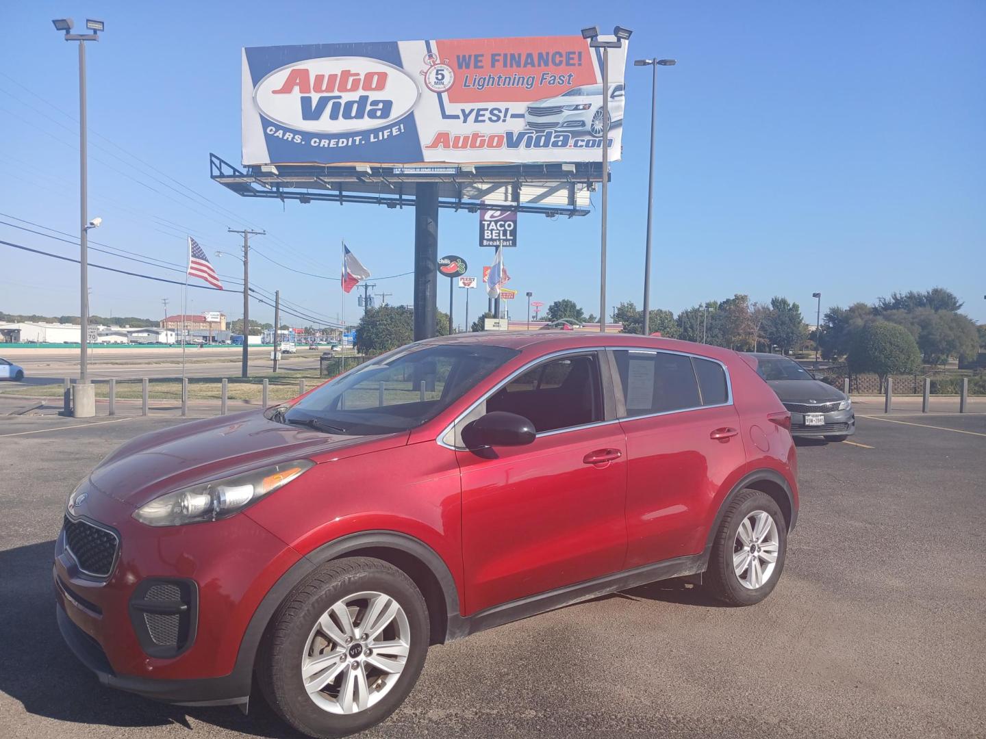 2018 RED Kia Sportage LX FWD (KNDPM3AC6J7) with an 2.4L V6 DOHC 24V engine, 6A transmission, located at 420 I-35E, Lancaster, TX, 75146, (469) 297-4144, 32.593929, -96.823685 - Photo#0